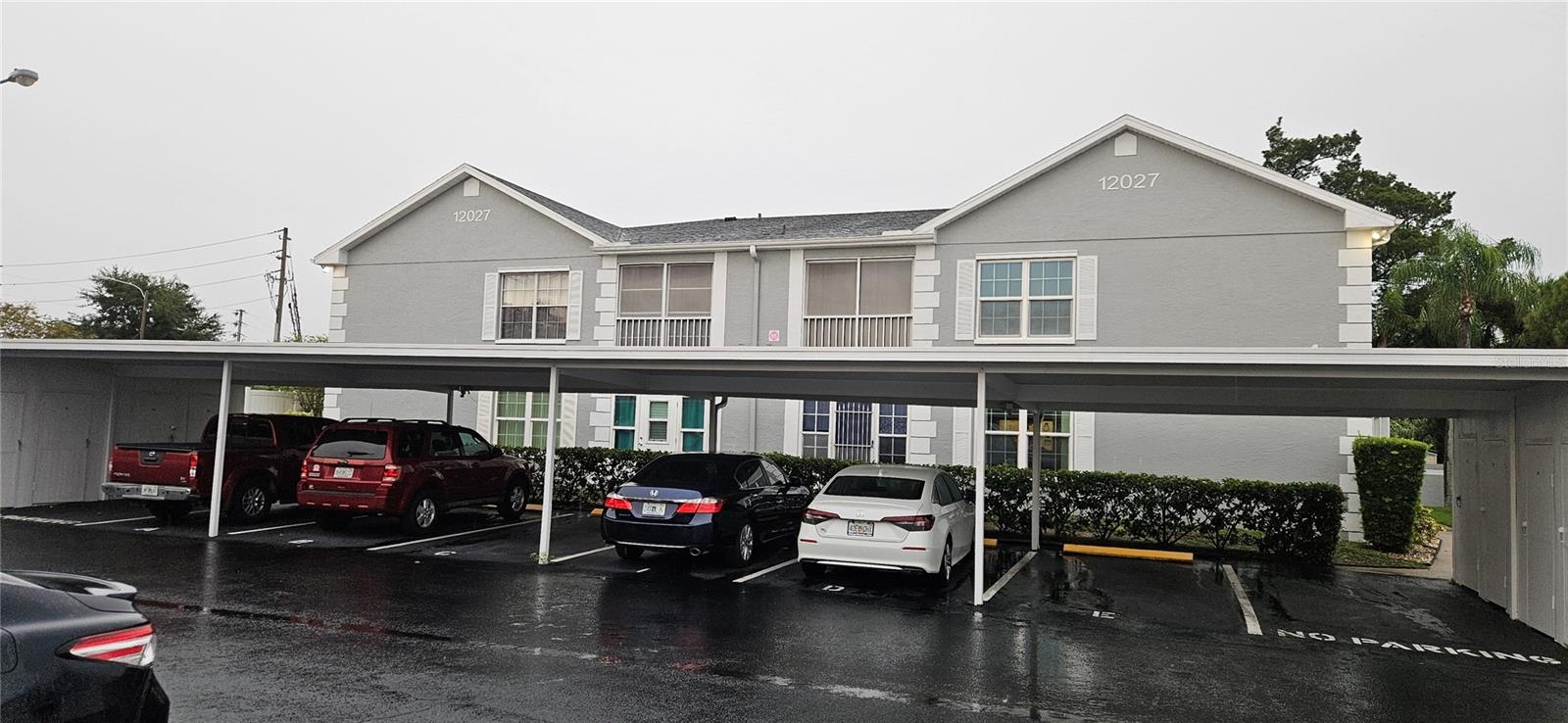 2 bedroom 2 bath 2nd floor end unit in 55+ aged community. Split bedroom floor plan. Primary bedroom with ensuite bath, walk in closet and private slider to patio. Screened patio with laundry closet. Water, sewer and trash included in HOA fee. Complex is surrounded by shops, restaurants and medical facilities. 4 miles to Hudson Beach. Home needs updating. Exterior of building maintained by Association. Room dimensions are approximate and should be verified.