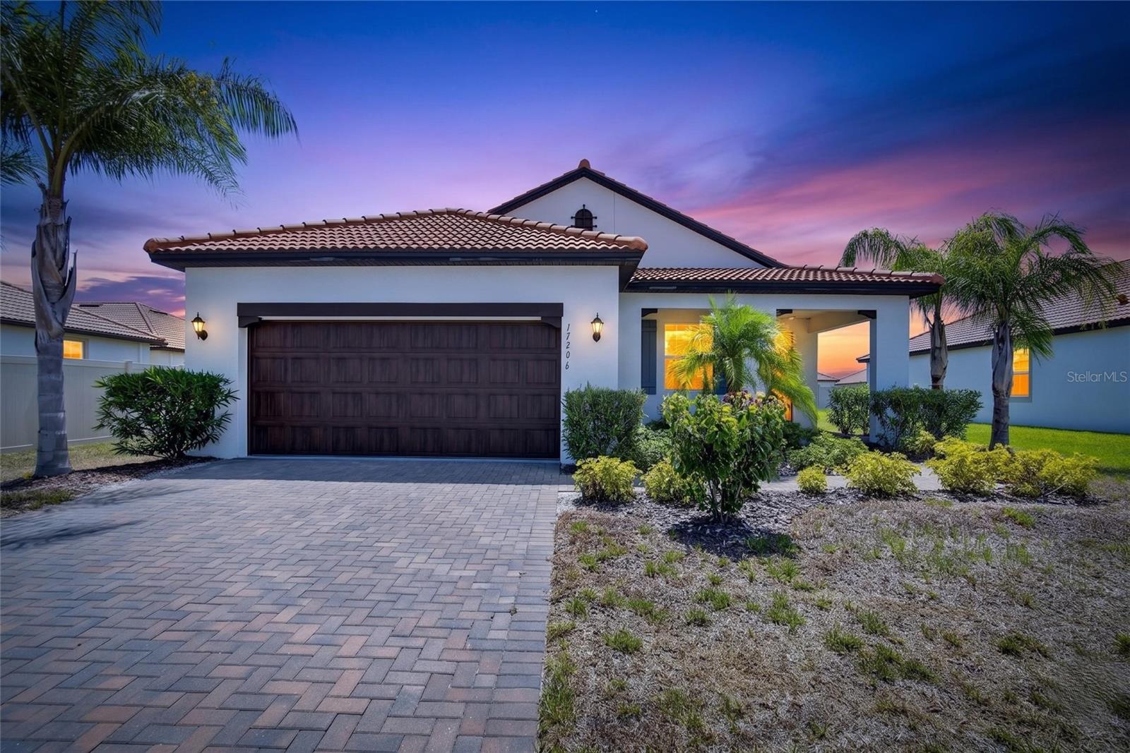 Welcome to effortless Florida living in the highly sought after 55+ community of Medley at Southshore Bay. Built in 2023, this beautifully designed 2 bedroom, 2 bathroom residence with a dedicated office offers the perfect blend of comfort, style, and low maintenance living. From the moment you arrive, you'll appreciate the paver driveway, tile roof, tropical landscaping, and inviting covered front porch. Inside, the bright open floor plan showcases wood look tile flooring throughout the main living areas, high ceilings, recessed lighting, crown molding, and an abundance of natural light. The chef's kitchen is the heart of the home, featuring a large quartz island with seating, stainless steel appliances, gas range, elegant gray cabinetry, generous walk in pantry, and seamless flow into the spacious dining and living areas, making everyday living and entertaining effortless. The private primary suite offers a spacious walk in closet and a luxurious ensuite bath with dual vanities and a large walk in glass shower. A split bedroom layout provides privacy for guests, while the versatile office is ideal for working from home, hobbies, or an additional flex space. Step outside to the covered screened lanai overlooking a peaceful backyard with room to relax, grill, or enjoy Florida's beautiful weather year round. Residents enjoy resort style amenities including a clubhouse, fitness center, pickleball and tennis courts, swimming pool, social activities, walking trails, and access to the famous MetroLagoon. Conveniently located near everyday essentials including Publix at Kings Crossing, Walmart Supercenter, ALDI, Winn-Dixie, Dollar General, The UPS Store, Great Clips, Subway, China Chen, Jack's Shack, Taqueria Guanajuato, and Domino's, with even more shopping, dining, and entertainment options just minutes away in Sun City Center, Riverview, and Brandon. HCA Florida South Shore Hospital is nearby, and easy access to US 301 and I-75 makes commuting to Tampa, St. Petersburg, Sarasota, and Bradenton quick and convenient. Spend your weekends exploring Apollo Beach Nature Preserve, Little Manatee River State Park, or enjoying waterfront dining nearby. Tampa International Airport, St. Pete Clearwater International Airport, MacDill Air Force Base, downtown Tampa, professional sports venues, world class entertainment, and the award winning Gulf beaches are all within an easy drive, making this home the perfect opportunity to enjoy the very best of Florida's Gulf Coast lifestyle.
