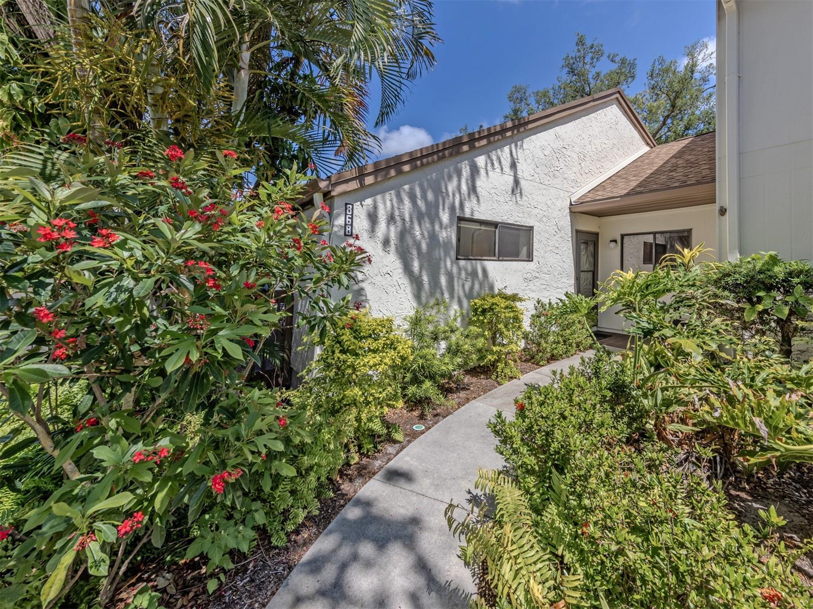 MOTIVATED SELLER! Welcome to resort-style living at Bird Bay Village! This exceptionally large three-bedroom, two-bath corner unit offers maximum privacy with no neighbors living above you. The generous, light-filled floor plan features a versatile third bedroom utilized as a spacious second living room, ideal for a home office, den or guest suite. Best of all, your low-stress HOA fee keeps budget planning simple by covering water, sewer, trash, cable, internet, exterior maintenance and ground care. Unbeatable location less than two miles from historic downtown Venice dining and Gulf Coast beaches. Just near your front door, enjoy premier community amenities including multiple pools, tennis, pickleball, a fitness center and direct access to the famous Legacy Trail. Schedule your showing today.