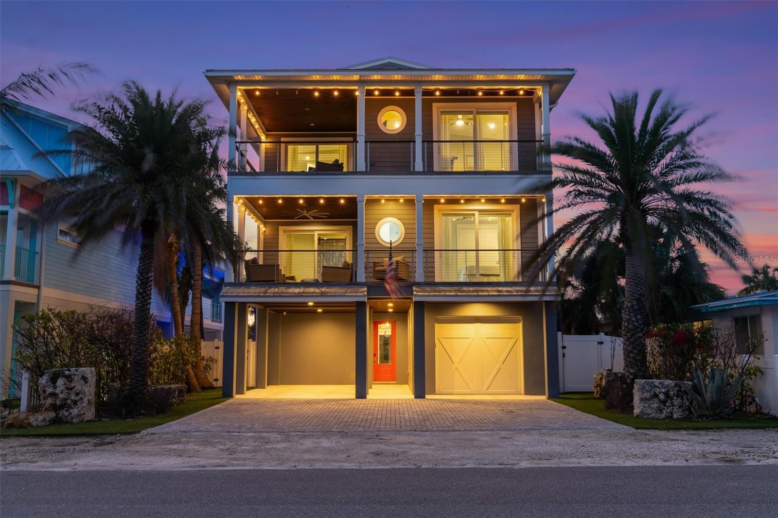 Welcome to your dream coastal retreat at 108 Magnolia Ave on the north end of Anna Maria! This stunning 4 bedroom, 4 bathroom home is just three houses away from the pristine Gulf of Mexico beach, offering the perfect blend of luxury and island living. Located on a sought after street, west of gulf drive and being one of the unique VERY deep lots is one of the many reasons why you don’t want to pass up this opportunity! Step inside to discover high-end finishes throughout, showcasing impeccable craftsmanship and style. The open-concept living spaces flow seamlessly for an indoor/outdoor living and entertaining experience. The kitchen has a large island, 2 sinks, high end stainless steel appliances including thermador 6 burner stove. Additionally, there is a wet bar including a subzero fridge and wine cooler which holds 65 bottles of wine! There are multiple balconies, 3 of which have awesome partial Gulf of Mexico views! Step outside to your private oasis featuring a large heated pool and spa, ideal for relaxing or entertaining. Enjoy lounging on the balconies under the string lights and gulf breeze. Hang out back at the outdoor bar, play some put put golf in the turfed side area or a game of ping pong! New pool pump and pool heater. 2 car epoxied garage but have fit 8 cars total in garages and driveway! Elevator, wood like ceramic tile through out, office area, and more! With the Sandbar restaurant and Captain Anthony’s being your backyard neighbors, it is fun and convenient for all! Spacious and beautifully designed, this home is your gateway to the ultimate beach lifestyle on Anna Maria Island. Paradise awaits!