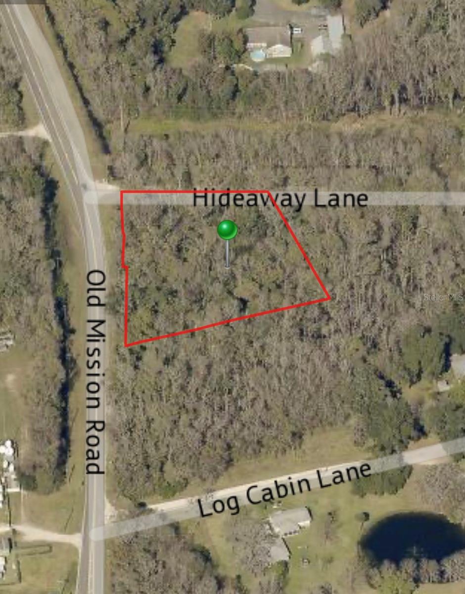 Just over 1.5 Acres in Edgewater on the corner of Old Mission Road and Hideaway Lane. Flood Zone X. Zoned Agricultural A3, allows house, modular or mobile. Can also have a barn. Allows horses and livestock. Setbacks 40’ front and rear, 25’ sides, maximum lot coverage 35%. Experience the abundance of recreational opportunities that Edgewater has to offer, with over 150 acres of city parks featuring walking and biking fitness trails, paddling trails, fishing, boating, picnicking, basketball, tennis and so much more. Fantastic location with easy access to I-95 and SR 44 to Historic Downtown Deland and Stetson University and all Daytona Beach has to offer including Daytona State College, Embry-Riddle Aeronautical University, and the World’s Most Famous Beach. You can also explore Canaveral National Seashore and Merritt Island Wildlife Refuge. Don't miss out on this incredible opportunity. Please confirm with zoning for specific questions regarding development. All information recorded in the MLS is intended to be accurate but cannot be guaranteed.