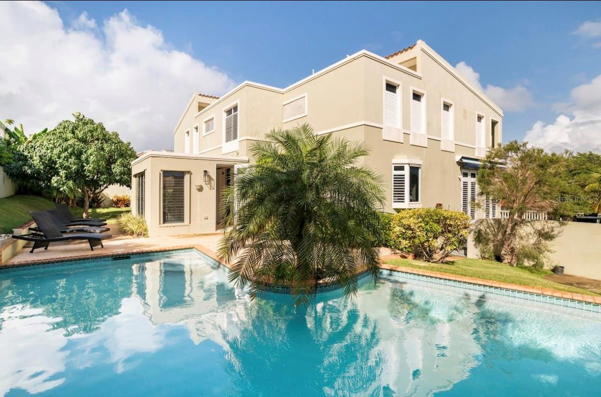 Charming house nestled in the heart of Palmas Del Mar, Humacao, Puerto Rico! This inviting retreat offers a perfect blend of comfort and convenience, ideal for families. Enjoy the refreshing outdoor pool, relax on your private patio, and take advantage of easy beach access. With amenities like air conditioning, a fully equipped kitchen, and modern comforts, it ensures a seamless and enjoyable stay. Explore nearby attractions, from stunning beaches to exciting activities, making it a perfect base for your family.