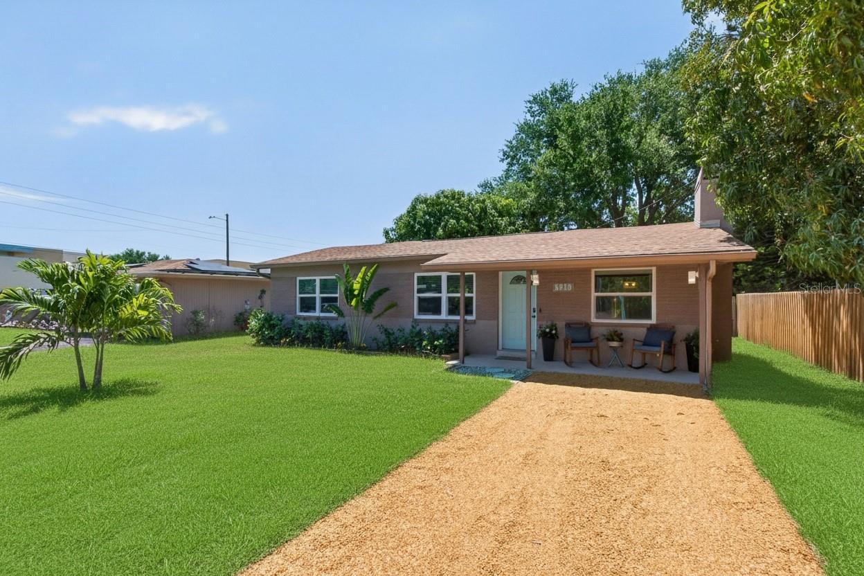 One or more photo(s) has been virtually staged. Priced below appraised value! Move right into this stunning, fully renovated modern farmhouse with ZERO major capital expenditures required. Nestled safely in preferred NO-FLOOD ZONE X (never flooded), this solid concrete-block home delivers the ultimate peace of mind and insurance savings. Every expensive structural and mechanical system is already done for you: 
2024: Brand new Roof installed 
2024: High-end Pella Hurricane Impact Windows (slashes energy & insurance costs)
2020: High-efficiency AC system
2026: Turn-key interior remodel with luxury quartz countertops & new appliances
Step inside to a bright, open family room with real-wood shiplap and stone fireplace. The designer kitchen flows effortlessly to your private outdoor oasis. Relax under a magnificent shade tree with mature staghorn ferns, host friends around the firepit, or let your pets roam freely in the large, fully fenced backyard. Just ONE block from the Pinellas Trail! Bike to Gulfport Beach, local Arts District dining, or the downtown St. Pete Pier with ease. Washer/dryer included, high-quality furnishings negotiable. Vacant, pristine, and ready for a quick, hassle-free closing. Schedule your showing today before this turn-key gem is gone!