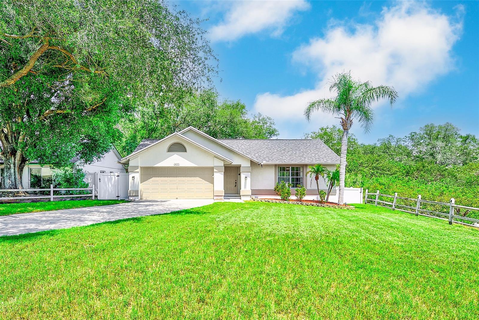 Come and live the ultimate Florida lifestyle. This single-story, 3-bedroom, 2-bathroom, 2-car garage home is located in the highly desirable Tarpon Springs community of Beckett Bay. Ideally situated at the end of the street on an oversized conservation lot with views of the Anclote River and its wildlife splendor. If you're an outdoor enthusiast, you're in luck; we have easy river access via a kayak or canoe via the community park next door. As you step through the front door, you'll immediately appreciate the thoughtful design and inviting ambiance. Just picture yourself hosting summer pool gatherings by your private pool with a river view. It's the perfect spot for sun-soaked afternoons. The three spacious bedrooms provide ample space for rest and relaxation, with large windows allowing in lots of natural light. Imagine unwinding on your pool deck with a glass of your favorite beverage. Beckett Bay isn't just about the home; it's about the lifestyle. Residents enjoy a fantastic recreational facility with a large community pool, tennis courts, basketball courts, picnic areas, grills, and a playground. You can also Hop on the nearby Pinellas Biking Trail—a 47-mile paved wonderland for walking, jogging, and cycling. When you're ready for a change of scenery, the coastal community of Tarpon Springs beckons. Explore its Mediterranean ambiance, enjoy shopping and dining, and perhaps even visit the famous Sponge Docks. Your new Beckett Bay home offers tranquility and convenient excitement—a rare combination that awaits you!

Major improvements include a new roof (8/2025), A/C system (10/2023), gutters (9/19/2024), and upgraded Terminix insulation completed on 10/14/2024. Additional updates include a pool pump/motor replacement on 3/4/2025, kitchen faucet replacement (9/2025), and a new garbage disposal installed on 9/25/2026.

Whether you’re relaxing poolside, entertaining guests on the screened lanai, or enjoying the privacy of the fenced yard, this home is designed for easy Florida living. Conveniently located near beaches, parks, shopping, dining, and everything Tarpon Springs has to share, this move-in ready home is one you won’t want to miss!