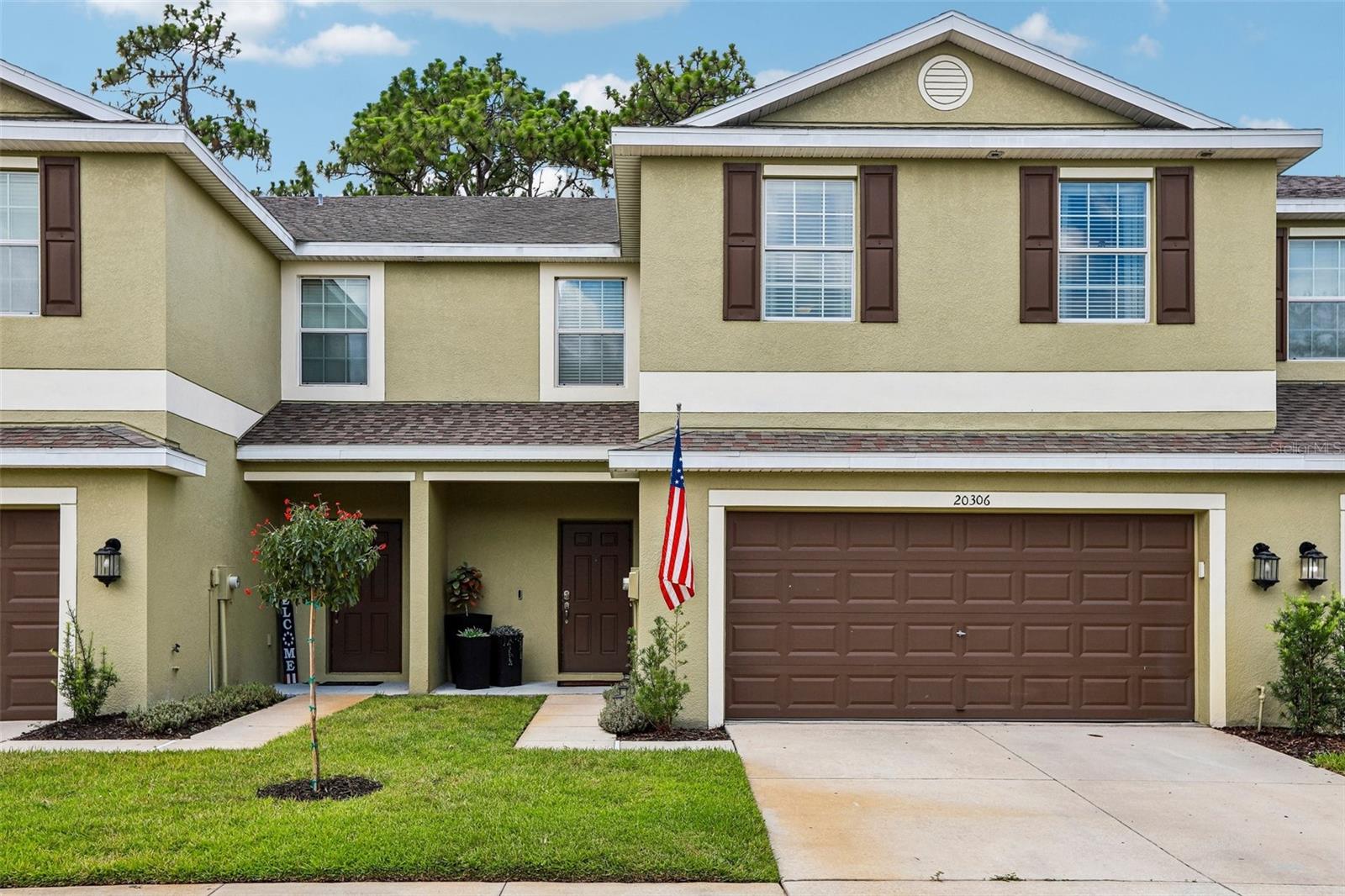 Welcome to this beautifully maintained townhome tucked away in a quiet and desirable Tampa community. Designed with both comfort and functionality in mind, the open-concept layout creates an inviting space that's perfect for everyday living and entertaining. The heart of the home is the spacious kitchen, featuring granite countertops, stainless steel appliances, abundant cabinet space, and a large center island that overlooks the main living and dining areas. Upstairs, a versatile loft provides the flexibility for a media room, home office, playroom, or second living area. The spacious primary suite offers a relaxing retreat with two walk-in closets and a well-appointed ensuite bath, while the additional bedrooms provide plenty of room for family, guests, or hobbies. An upstairs laundry room adds everyday convenience. Step outside to the screened lanai and enjoy peaceful views of the green space and mature trees, an ideal spot for morning coffee or unwinding at the end of the day. An attached two-car garage and low-maintenance living complete the package. Conveniently located near shopping, dining, major highways, and everything Tampa has to showcase, this home is ready for its next owner. Schedule your private showing today!