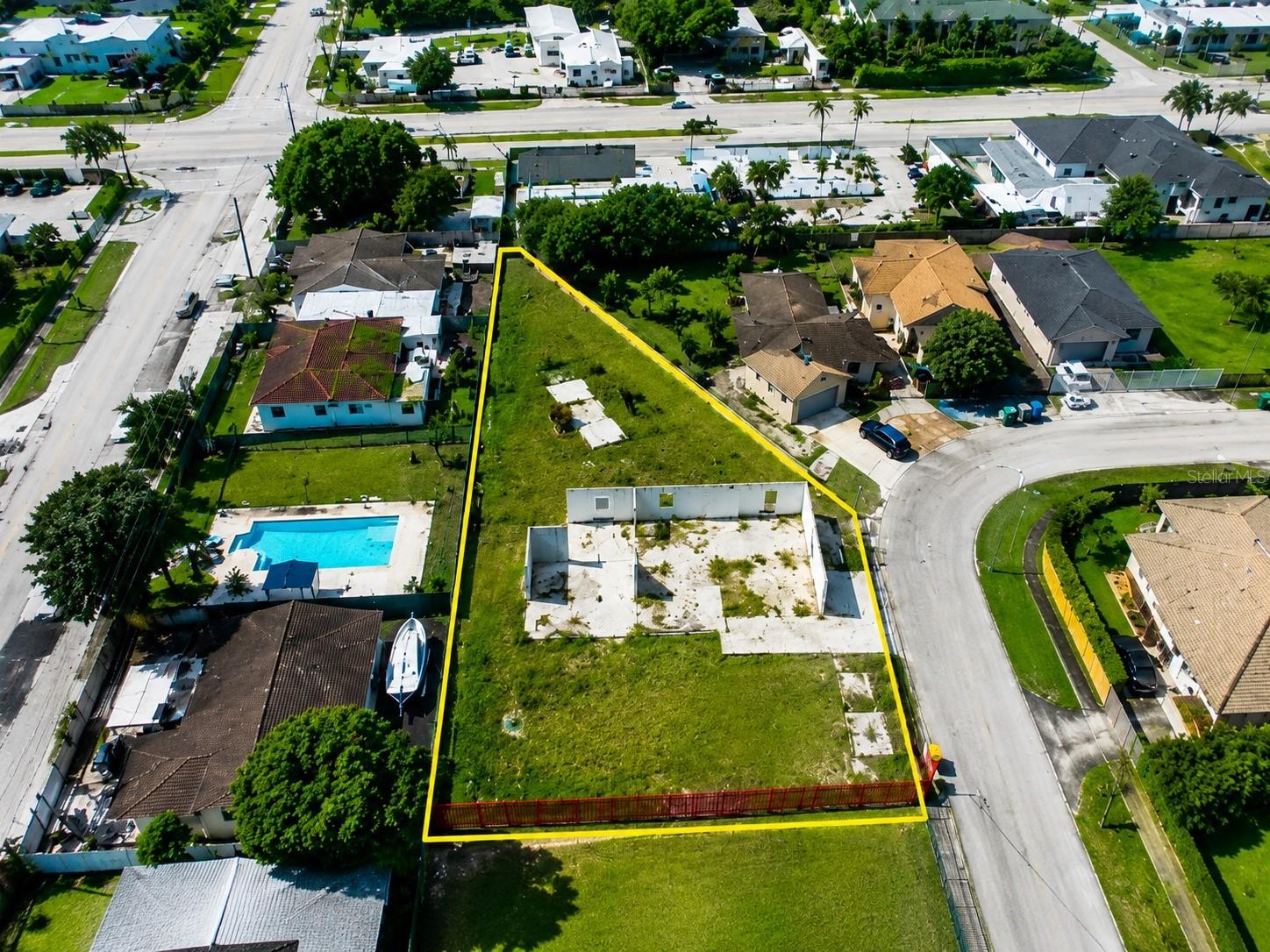 Exceptional opportunity to build your dream home on this expansive 21,392 sq ft cleared and fenced residential lot in Miami-Dade County. This nearly half-acre property offers tremendous value with previously approved plans and permits for a spacious 4-bedroom, 4-bathroom custom residence, saving buyers significant time and expense in the development process. Utility approvals and infrastructure planning have already been completed, and permits are eligible for renewal.

Whether you’re a builder, investor, or future homeowner, this property presents a rare chance to acquire a development-ready homesite with much of the groundwork already in place. Enjoy the flexibility of designing your future residence on an oversized lot with ample space for outdoor living, parking, and additional amenities.

Survey, approved plans, and supporting documentation available. Don’t miss this unique opportunity to bring your vision to life in one of Miami-Dade’s growing residential areas.