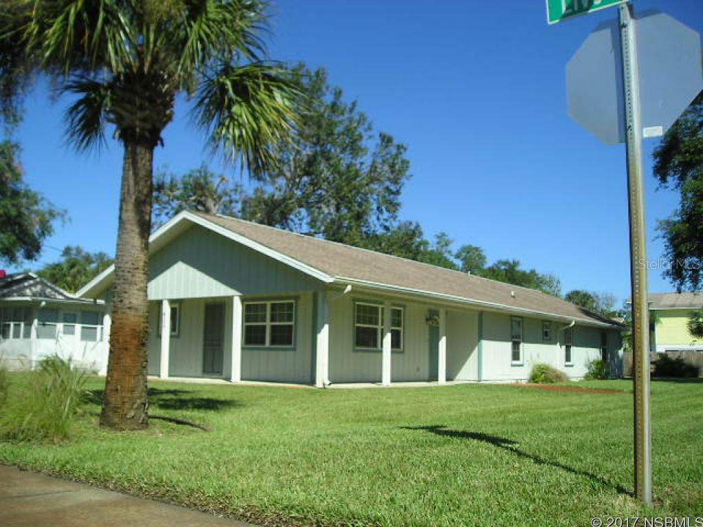 Charming home between US 1 and the river on 50x150 CORNER LOT, 2 blocks to Riverside Dr and short walk to Canal St shops.   Spacious bedrooms        open & bright living area,  Impact resistant windows throughout home.  2 CAR GARAGE with laundry area,  alley access, fenced back patio.  WELL for irrigation.   Flood zone X - NO FLOOD INS. required!Furnishings can remain if wanted by the buyer ;Water: City