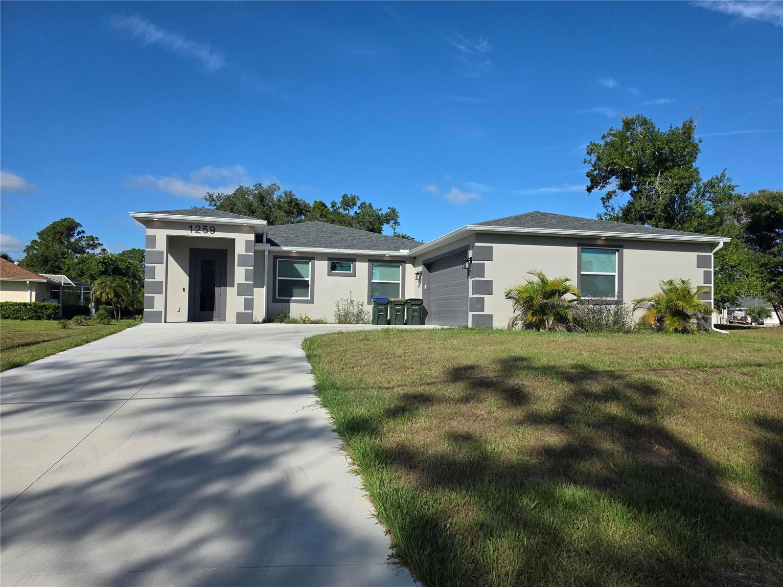 Welcome to 1259 Kaayan St, located in North Port, FL. This charming house has a promising living space nestled in a desirable neighborhood. Its well-maintained exterior provides an inviting ambiance, complemented by a spacious yard that has potential for landscaping or outdoor activities. The property presents a functional layout that ensures comfortable living. North Port is known for its community atmosphere, and this residence is ideally situated to enjoy the area's amenities. Whether you are starting anew or seeking a place to call home, this house is a wonderful opportunity to create lasting memories. With its distinctive character and prime location, 1259 Kaayan St awaits your personal touch to transform it into your dream residence.