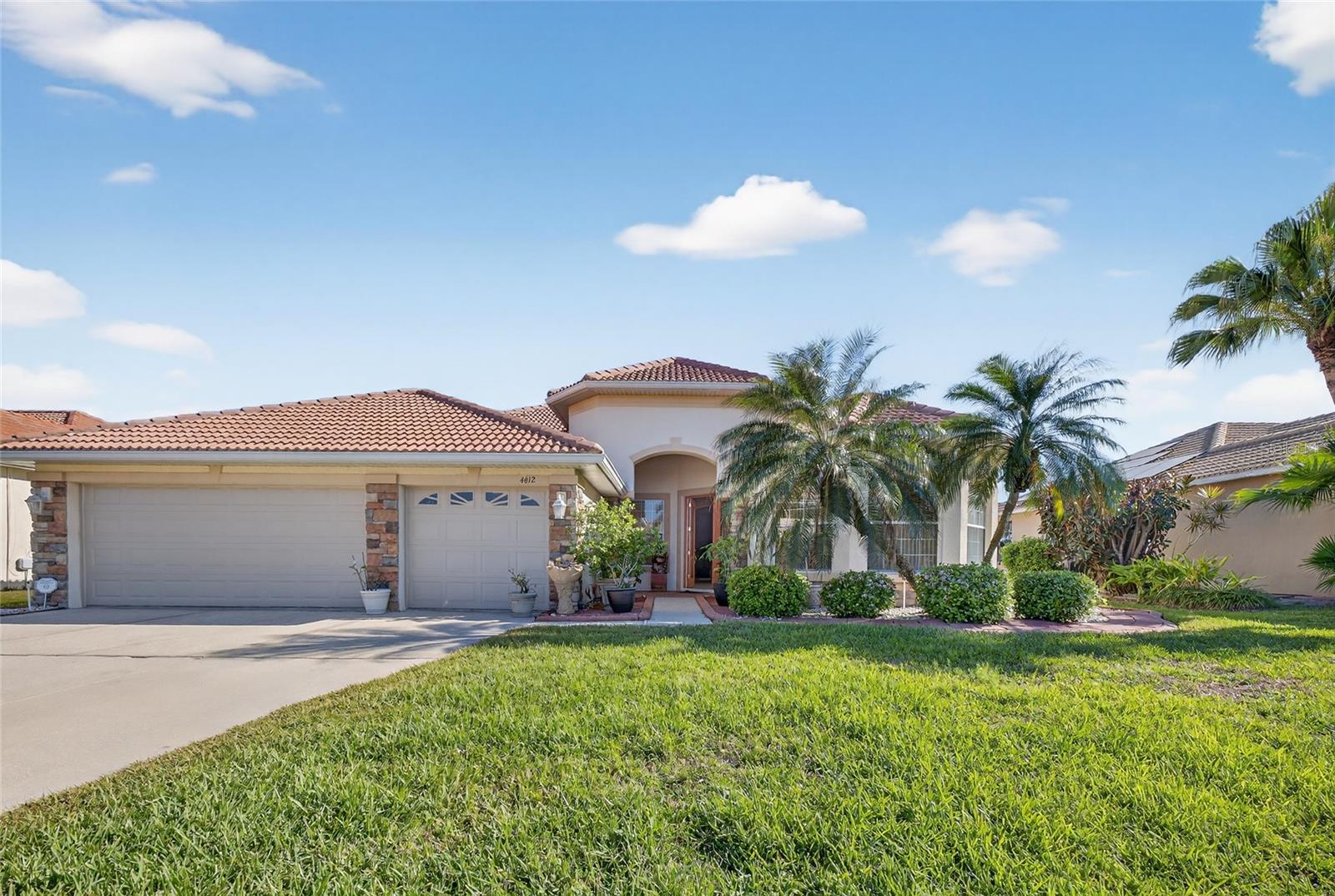 Welcome to an ALL-IN-ONE home in central Bradenton! Gated community means security and comfort right when you get in the entrance. It offers an open floor plan with plenty of sun lights coming in the home. The home sits on a single level with 4 bedrooms, 3 full baths, 2 large living rooms overlooking an upgraded kitchen. No need to tear any carpet out from this home cause of the wood laminate and tile floorings. The 3 car garages provides plenty of parking and storage for all your needs. And most of all... the tile roofing on this home will last you for years to come. Last but not least... the breath taking water view in the back of this home will take your breath away.
