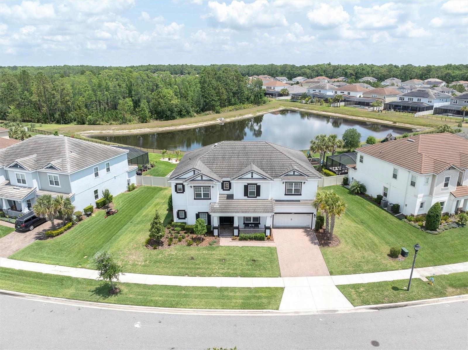 Short Sale. Welcome to 4188 Barbour Trail in Starkey Ranch, where generous living space, thoughtful upgrades, and peaceful pond and conservation views come together on an oversized 75' x 150' homesite.

This Taylor Morrison Bimini floor plan offers more than 4,100 square feet with 6 bedrooms, 3.5 bathrooms, a loft, game room, dedicated theater room, and a 3-car garage with custom tandem bay and 240V EV charger. The main-level owner’s suite creates a private retreat with tray ceiling, soaking tub, dual vanities, walk-in shower, and two custom walk-in closets, one currently configured as a home gym.

Soaring ceilings and an open-concept layout create an inviting setting for everyday living and entertaining. The kitchen features dual islands, built-in stainless steel appliances, gas cooktop, pot filler, butler’s pantry, and breakfast nook overlooking the screened patio and tranquil backyard. The formal dining room offers additional space for hosting family and friends.

Upstairs, five secondary bedrooms provide flexibility for guests, offices, playrooms, or multigenerational living. A spacious loft is currently used as a game room, while the dedicated theater room includes a Dolby Atmos setup with Sony 4K projector, speakers, and screen. A Jack-and-Jill bath connects two bedrooms, with an additional full bath serving the remaining bedrooms.

Additional features include a tankless gas water heater, laundry room with pet-washing station, and washer and dryer included. Select furnishings may be available separately.

Starkey Ranch residents enjoy access to neighborhood trails, parks, pools, playgrounds, shopping, dining, and the convenience of Odessa living with easy access to Tampa Bay.

Short sale. Sale is subject to third-party lender approval.
