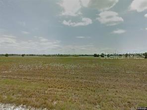 Excellent opportunity to own a residential vacant lot in the deed-restricted community of Rotonda Villas in Placida. This homesite offers access to public water and sewer services and benefits from a low HOA. Conveniently located near area beaches, championship golf courses, marinas, and a variety of restaurants, the property provides an ideal setting for a future primary residence, seasonal retreat, or investment property. Enjoy the convenience of nearby amenities while being surrounded by the natural beauty of Florida’s Gulf Coast.