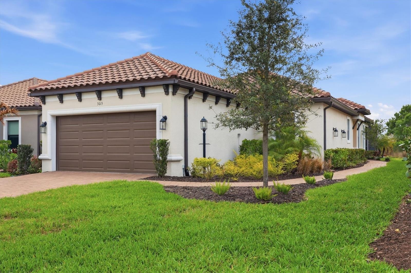 Welcome to resort-style living in the highly sought-after Esplanade at Azario Lakewood Ranch, where luxury, comfort, and lifestyle come together seamlessly. This beautifully appointed (Golf Deeded) Roma floor plan is offered **Turnkey Furnished**, making it truly move-in ready—just bring your suitcase and start enjoying everything this exceptional home and community have to provide.

Perfectly positioned on a serene **nature preserve**, this residence provides a rare sense of **peace, privacy, and picturesque views**, creating your own tranquil retreat right in your backyard. Step outside to your **brand new custom pool and spa**, designed for both relaxation and entertaining. Whether you're enjoying a quiet morning swim or hosting sunset gatherings, this outdoor space delivers the ultimate Florida lifestyle.

Inside, the home showcases **high-quality finishes and thoughtful upgrades** in all the right places. The kitchen is a standout with premium cabinetry, elegant countertops, and upgraded appliances—ideal for both everyday living and entertaining. The bathrooms continue the theme of refined design with upgraded fixtures and finishes that create a spa-like experience.

Living in Esplanade at Azario Lakewood Ranch means access to an unmatched array of **resort-style amenities**. Enjoy the championship golf course, beautifully maintained tennis and pickleball courts, and a full-service fitness center. The community’s vibrant **Culinary Center** offers interactive cooking classes, wine tastings, and multiple on-site dining options—perfect for those who appreciate both fine food and social experiences.

Whether you're searching for a full-time residence, seasonal retreat, or investment in luxury living, this home delivers the perfect combination of **elegance, convenience, and an amenity-rich lifestyle** in one of Lakewood Ranch’s premier communities.