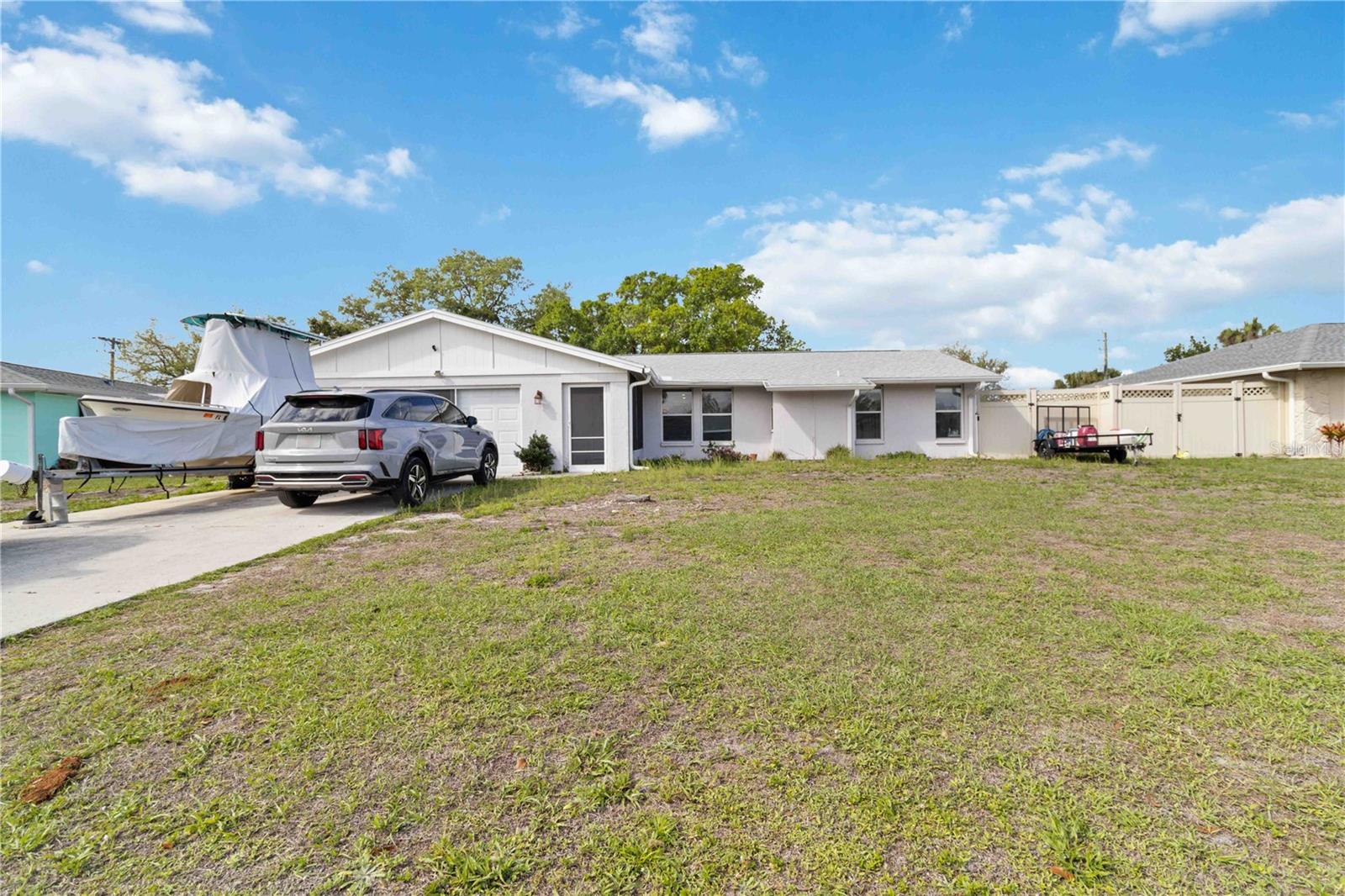 Welcome to this beautifully updated 3-bedroom, 2-bathroom home nestled in the golf cart friendly Bird Sanctuary neighborhood of Venice East. With 1,499 square feet of thoughtfully designed living space, this home delivers comfort, functionality, and Florida charm in equal measure.

Step inside to find an updated kitchen and bathrooms featuring ceramic tile throughout. The separate living room and family room layout, with the kitchen positioned between them, creates an ideal setup for entertaining, a home office, or keeping an eye on the little ones while you cook. The split bedroom floor plan offers privacy, with a master en-suite boasting a walk-in closet. Inside laundry adds everyday convenience, while the 2-car garage provides ample storage and parking.

Major updates bring peace of mind — the roof was new in 2023, the breaker box has been updated, the hurricane rated garage door was replaced in 2022, and the water heater is newer. Outside, the screened lanai overlooks a partially fenced, park-like backyard complete with a fire pit, vegetable garden, and storage shed. Located in an X flood zone with NO HOA and governed only by Sarasota County rules, this property offers freedom and flexibility. City water and sewer are already connected.

The location is unbeatable — a public golf course nearby, Historic Venice Island and beaches within minutes, and I-75 just 10 minutes away.

Schedule your private showing today!