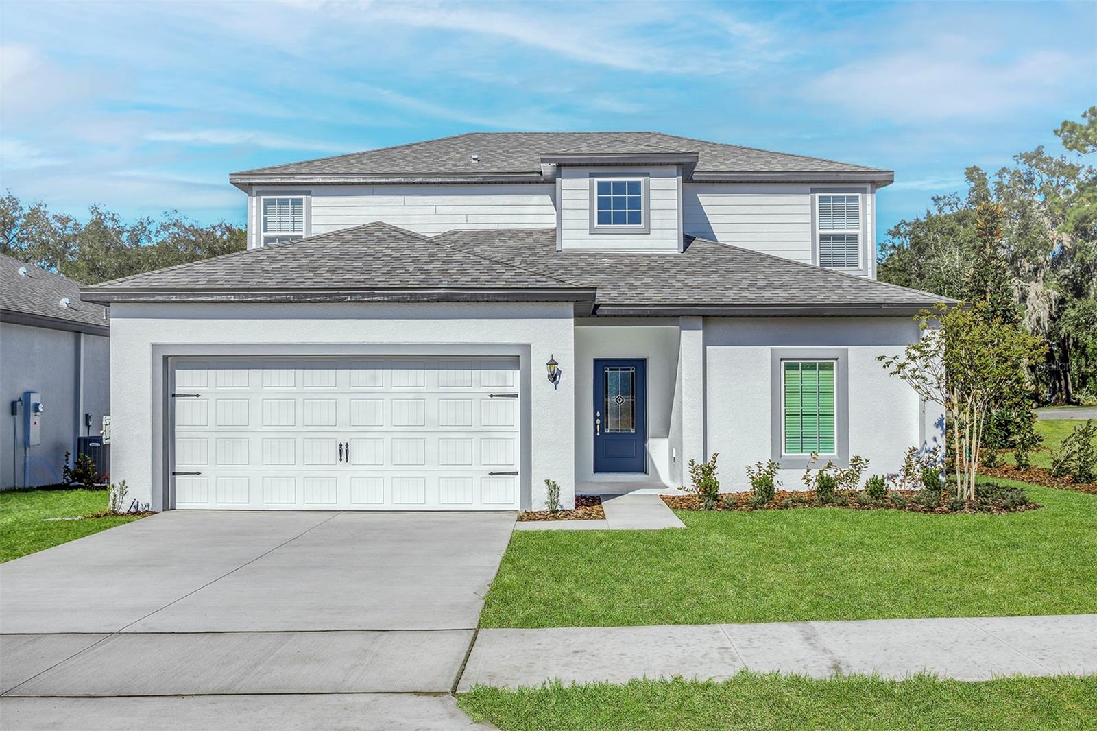 Pre-Construction. To be built. Welcome to the Useppa model in the desirable Tula Parc community of Astatula, FL—a spacious and thoughtfully designed 5-bedroom, 2.5-bathroom two-story home built for comfortable living and effortless entertaining.

The main floor features an inviting open-concept layout where the expansive family room, dining area, and chef-ready kitchen come together seamlessly. The kitchen is beautifully finished with granite countertops, 36” upper wood cabinets with crown molding, and energy-efficient Whirlpool® appliances, creating a space that is both functional and stylish. A flex room/den on the first level adds versatility, perfect for a home office, playroom, or additional lounge space.

Upstairs, enjoy even more room to spread out with a large game room and five generously sized bedrooms. The private master suite serves as a relaxing retreat, featuring a spacious walk-in closet and an en-suite bathroom complete with dual sinks and a step-in shower.

Additional upgrades include luxury vinyl plank flooring, LED flush-mount lighting, a programmable thermostat, double-pane Low-E windows, and a Wi-Fi-enabled garage door opener for modern convenience. The home also includes a two-car garage and professionally landscaped front yard, enhancing its curb appeal.

Located in Tula Parc, residents have access to a community gazebo and playground, and are just minutes from Little Lake Harris and the Chain of Lakes, where you can enjoy boating, fishing, and kayaking. With nearby parks and quick access to Orlando’s shopping, dining, and attractions, this home offers the perfect balance of space, comfort, and location.

Come experience all that the Useppa model has to offer—schedule your private showing today!