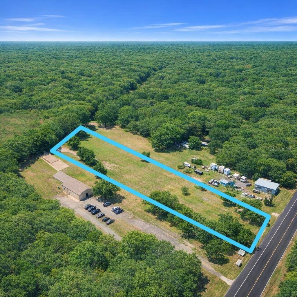 HIGH TRAFFIC commercial lot off Hwy 19. Located just north of SR 98 intersection with shopping, restaurants and gas stations. Lot is partially cleared on public water and septic. There is a sidewalk/bike path in front and a turn out in the median off Hwy 19 right in front for easy customer access to those traveling southbound.