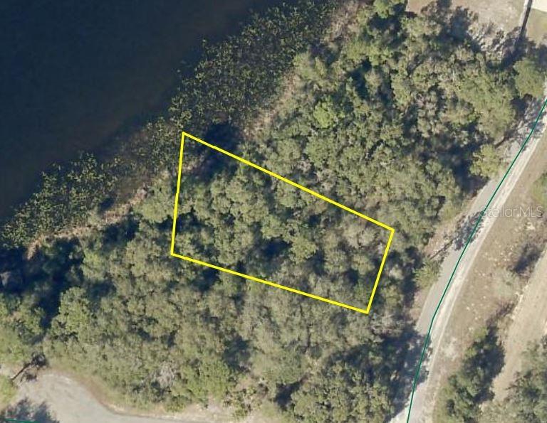 .33 Acre lot in Silver Springs Shores East, with Lake View