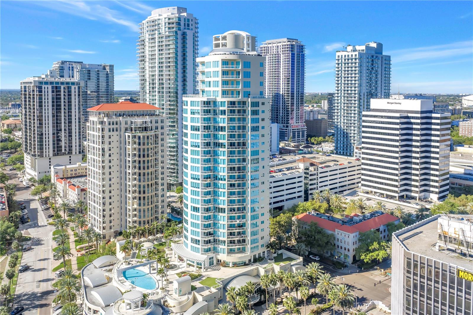 Under contract-accepting backup offers. The team at Haven Design created the epitome of luxury living at this crowning jewel at the Ovation residence. This impeccably renovated 3,660 square-foot condominium exudes elegance at every turn. From the moment your private elevator opens into your exclusive vestibule, the panoramic views of the Northeast side of St. Petersburg unfolds before you, offering an unobstructed vista of the city’s skyline and the sparkling waters beyond.

Every inch of this stunning home has been designed to perfection, with no detail overlooked. Expansive 10-foot ceilings, exquisite flooring, custom furnishings, and carefully curated lighting combine to create a space that is both serene and invigorating. Flooded with natural light, each room offers unparalleled views, bringing a sense of calm and inspiration to your everyday living.

The owner’s suite is a sanctuary, complete with a luxurious en suite bathroom, while two generously sized guest suites, each featuring private terraces, provide a peaceful retreat for family and friends. A versatile den or office, adorned with custom-built cabinetry, offers a personal touch to this already exceptional space.

Outside, multiple terraces enjoy panoramic views from almost every angle, perfect for enjoying St. Petersburg’s vibrant downtown and waterfront. The convenience of two high, dry parking spaces, plus private guest parking, ensures that you and your visitors experience ultimate comfort and ease.

Ovation's exclusive amenities include a 24-hour concierge, full-time onsite property manager, heated pool, spa, saunas, and a putting green—each designed to enhance your lifestyle. Located along scenic Beach Drive, Ovation perfectly balances privacy with the excitement of urban living, just steps away from charming cafés, world-class museums, upscale shopping, and serene waterfront parks.

Don’t miss the opportunity to experience the pinnacle of downtown living.