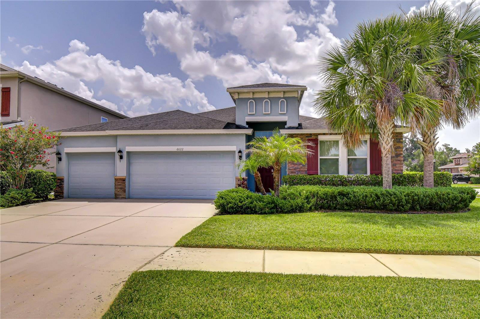 Get ready to fall in love with this stunning home in the sought-after Riverside Bluff community! Perfectly positioned with easy access to Downtown Tampa, I-4, I-75, and the Selmon Expressway, commuting is a breeze. Nestled in the heart of North Riverview—just one mile from Winthrop Town Center—this home offers the ideal blend of luxury and convenience. Shopping, dining, parks, and the community's private fishing pier, complete with kayak and canoe access to the Alafia River, are all just steps away. This beautiful 4-bedroom, 3-bath, 3-car garage corner-lot home welcomes you with tropical landscaping and stacked-stone accents. Freshly updated with new interior paint, brand-new carpet, and newly replaced glass in the sliding glass doors, this move-in-ready home is ready for its next owners. Inside, a versatile bedroom with French doors makes the perfect home office. The open-concept main living spaces flow seamlessly together and extend to a screened lanai, creating the perfect setting for both everyday living and entertaining. At the heart of the home, the kitchen shines with 42-inch cabinetry, stainless steel appliances, a spacious pantry, and a breakfast bar. Additional cabinetry in the breakfast nook provides even more storage, while the connected layout ensures you're always part of the conversation. The private primary suite is tucked at the back of the home and features a tray ceiling, serene backyard views, a large walk-in closet, and a private en-suite. Two additional bedrooms, each with nearby full baths, provide comfort and privacy for family or guests. Step outside to enjoy the screened lanai year-round—perfect for gatherings or quiet evenings. The Riverside Bluff community also offers a private walking trail leading directly to the Alafia River fishing pier, making it a dream for nature lovers and outdoor enthusiasts alike. Don't miss your chance to call this gorgeous home yours—schedule your private showing today!