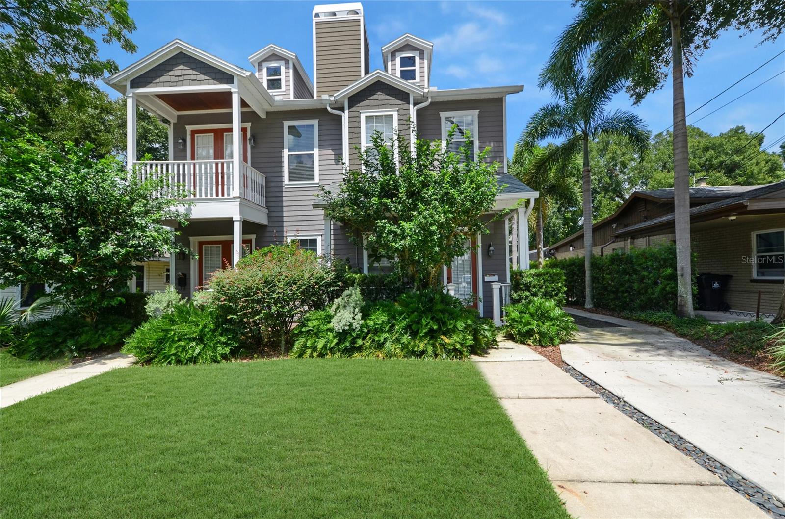 BRAND NEW ROOF!! Seller offering interest rate buy down, 1 point contribution at closing. Custom built townhome in Lake Davis Heights Downtown Orlando. This home features hard wood floors throughout, custom wrought iron railings, RH hardware and custom drapery on windows throughout. Enjoy two wood burning fireplaces, in both the living room and primary bedroom. Tall doors and high ceilings throughout open the space up while bringing attention to the beautiful crown molding. Spacious kitchen with a large island, features recently replaced stainless steal appliances. Rear loaded detached two car garage with plenty of attic storage. Conveniently located near the Greenwood Urban wetland/dog park, Lake Davis, and Cherokee Park. Don't miss this opportunity to live downtown with low monthly HOA fees!!