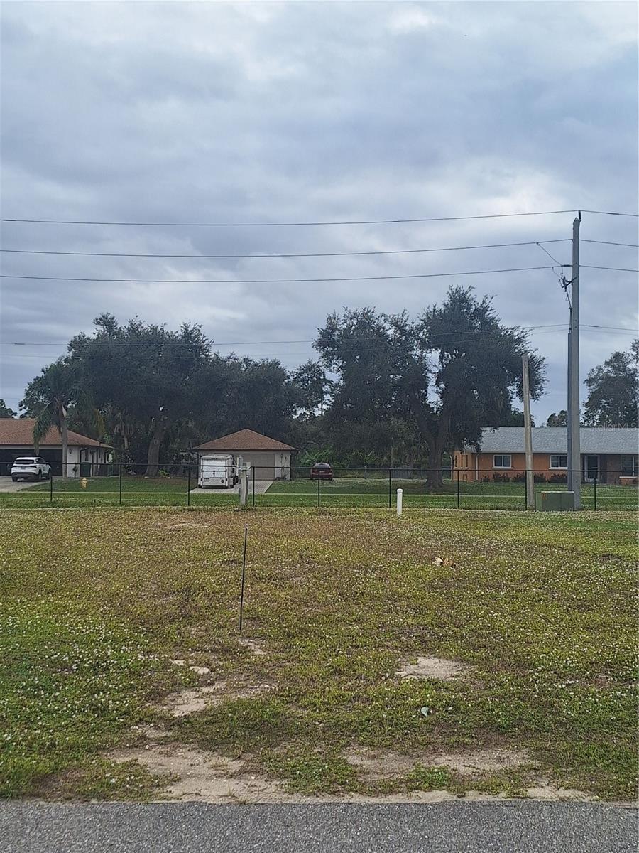 Best Deal in Holiday Park an Amazing Value! Own Your Piece of Paradise in the Highly Sought after Holiday Park Community.  This Vacant Deeded Lot in Wonderful Holiday Park and Recreation District is Ready for Your Mobile Home.  You Own the Land and HOA Fess are Included in Your Real Estate Tax Bill.  Land is Located in the Welcome Pet Area.  This Awesome Community Offers 2 Clubhouses, 2 Pools, Fitness Center, Tennis, Pickleball & Bocce Ball Courts, Shuffleboard, Horseshoes, Billiards, Ping Pong, Card Room Darts and Library.  Enjoy a Wide Variety of Clubs and Events Throughout the Year.  Convenient Location Close to Gulf Beaches, Shopping, Golf Courses, Great Dining, Sports Facilities and Cultural Events.