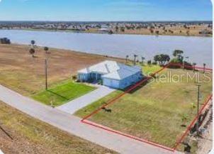 Large waterfront lot to build your dream home in the Rotonda Meadows community in Port Charlotte. Deed restricted community.Central water and sewer.