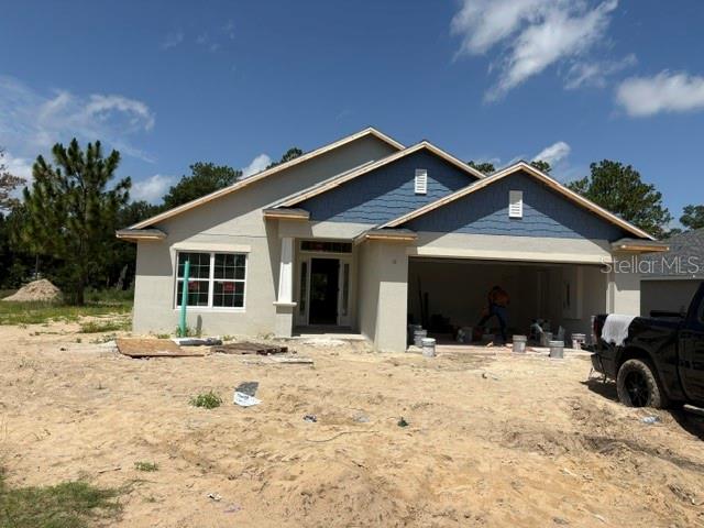 Under Construction. WELCOME TO THE EXQUISITE GOLFING COMMUNITY OF JULIETTE FALLS LOCATED OFF WEST HIGHWAY 40 IN DUNNELLON.  JULIETTE FALLS HAS BEEN CONSISTENTLY RANKED THE TOP 10  PUBLIC GOLF COURSES IN THE STATE OF FLORIDA.  A RECENT ARTICLE IN GOLF COAST MAGAZINE IS QUOTED CALLING JULIETTE FALLS “A GREAT PLACE TO GOLF, A BETTER PLACE TO LIVE”.   ENJOY DINING AT THE CLUBHOUSE WITH DAILY MENU SPECIALS AND SPECIAL DINNER OCCASIONS.  MEMBERSHIP NOT REQUIRED TO ENJOY THE CLUBHOUSE/RESTAURANT FACILITIES.
THOUGHTFULLY LAID OUT SPLIT 4BED/2BTH OPEN FLOOR PLAN HOME COMES WITH MANY TASTEFUL UPGRADES INCLUDING, TILE WALK IN SHOWER IN MASTER BATH, VAULTED CEILINGS, UPGRADED SHAKER CABINETS W/PULL BARS, GRANITE COUNTERS IN KITCHEN AND BATH AND STAINLESS APPLIANCES, GRANITE COUNTERS KITCHEN & BATH. TO NAME A FEW.    ALL THIS ALONG WITH A BUILDERS 10 YEAR WARRANTY.  RENDERINGS ARE FOR ILLUSTRATIVE PURPOSES ONLY, FINAL PRODUCT MAY VARY.  ESTIMATED COMPLETION DATE IS END OF AUGUST 2026.  STANDARD BANK CLOSING COSTS PAID WITH PRE-APPROVAL AND CLOSING WITH PREFERRED LENDER.