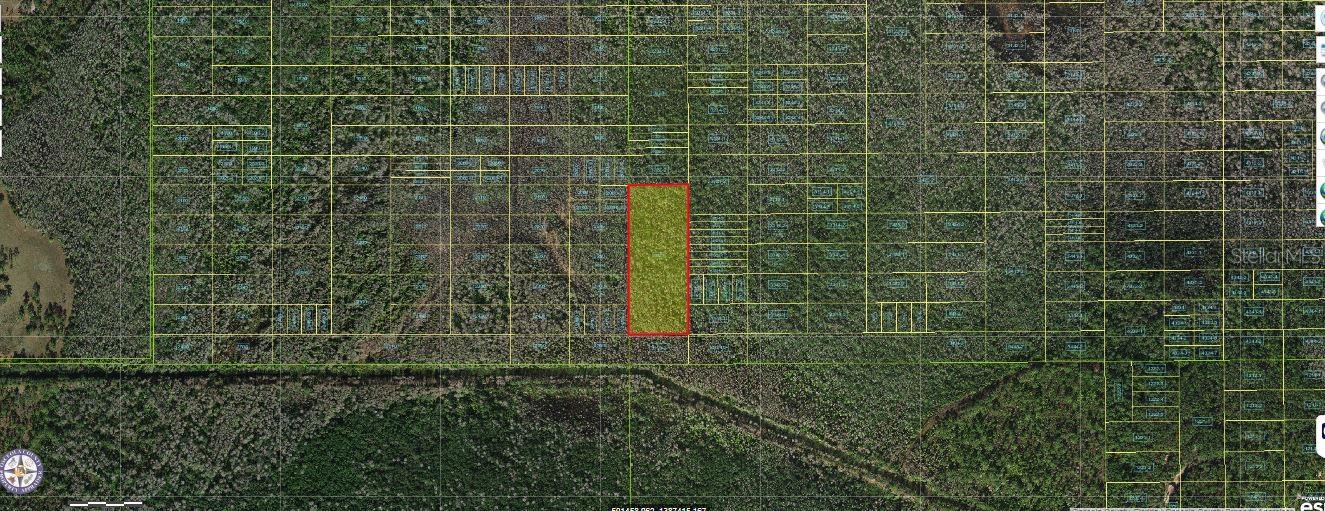 6.29-acre agricultural lot on Holopaw Groves Road in St. Cloud, Florida 34772.  "Zoning: OAC" Rural acreage not build able.  creating a private rural retreat, this property provides the freedom and flexibility to bring your vision to life.  Whether you’re investing in land, or seeking a spacious countryside escape, this generous parcel presents outstanding potential and value. Pin Location: Latitude 28.14634734, Longitude -81.19339043. Note: buyers I emphasize the importance of conducting thorough due diligence to ensure that the property meets your expectations and requirements.
