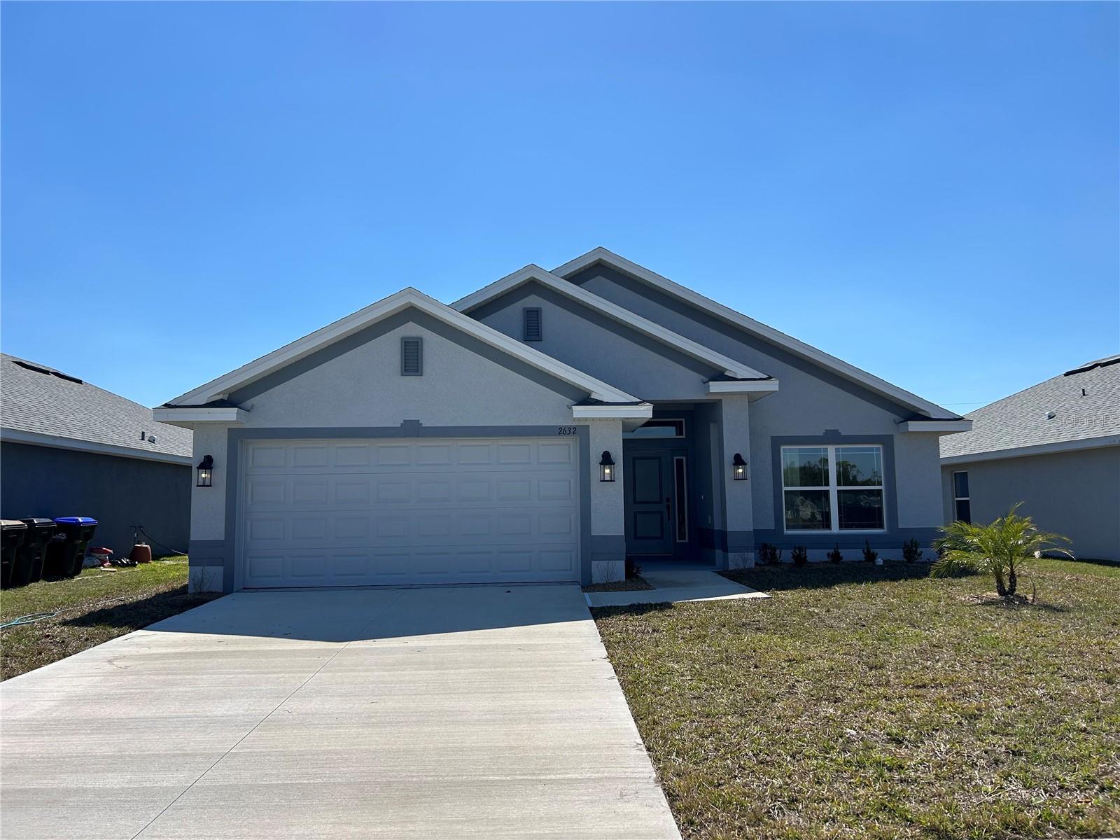MOVE IN READY!!!  City water and sewer and No flood zone! This beautiful new construction home offers 1,820 square feet of thoughtfully designed living space, ideal for family gatherings and entertaining guests. Enjoy city water and sewer, ceramic tile throughout (with carpet in bedrooms), quartz countertops, and soft-close cabinets in the kitchen. The spacious layout also features a tiled shower, and a view of the community pond. Adams Homes delivers quality and style with durable, mildew-resistant 30-year shingles, updated architectural elevations, and designer features including: - Brushed nickel door and bath hardware - 5 1/4" decorative baseboards - 5-panel doors with lever handles - LED recessed lighting - 36" upper cabinets with crown molding - Double-pane, insulated, tilt-in sash windows This home comes with a 10-year structural warranty, and with the use of a preferred lender, the seller will cover the majority of closing costs. Don't miss your chance to own this beautiful home!