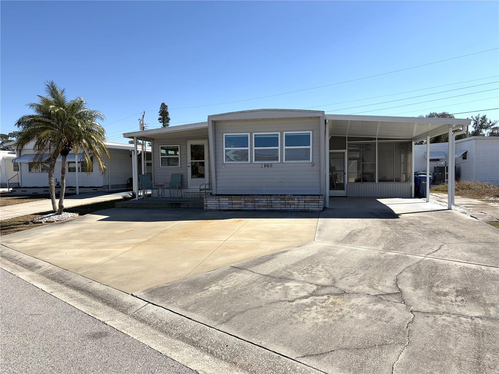This furnished home features two bedrooms and one and a half bathrooms, a recently installed TPO roof, and a remodeled kitchen with soft-close cabinetry. The interior is exceptionally clean, boasts updated windows, an in-house laundry room, and stylish accent colors throughout the walls and furniture.
Tri-par Estates provides a wealth of amenities: enjoy a heated and cooled large pool for year-round swimming, a brand-new spa, tiki hut, pickleball courts, fitness center, shuffleboard, miniature golf, horseshoes, and various recreation hall rooms equipped with ping-pong, billiards, card tables, a kitchenette, sewing areas, and more. The expansive clubhouse regularly hosts dinners, dances, and other events.
Situated only minutes from downtown Sarasota, you’ll have easy access to marinas, shopping, restaurants, museums, the world-renowned Siesta Key and Lido Key beaches, and Sarasota airport.
In this special park and recreation district, residents own their land directly, with no separate HOA fees—an annual fee of $1,648 is included in your property taxes. Internet and TV included in the annual fee This is also a golf cart-friendly community with optional RV or boat storage when available. Don’t miss the opportunity to join this lively, well-established neighborhood.