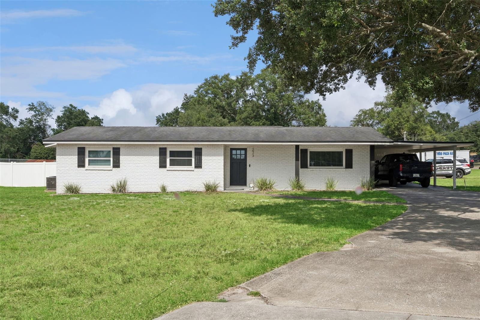 Welcome home to 273 Avalon Road, a stunningly beautiful 4 Bedroom, 2 Bath home with 2,459 sqft of living space on almost a 1/2 acre lot !!! Just minutes from Down Town Winter Garden, this is a one of a kind property that was remodeled giving a modern flair to a farmhouse style property. The kitchen has a large center Island, with granite counter tops, stainless steel appliances, custom cabinets, with plenty of bar stool seating. The kitchen flows into a dining/living room space, with lots of windows to let in natural light, a further step down leads into a second space which could be a second living space/home school/office. The Primary bedroom is spacious with a large walk in closet and ensuite. Three additional bedrooms and bathroom complete this unique home. Outside we have a carport, lockable oversized storage for bikes etc, in the backyard there is a smaller fenced area with a shed and patio area making it perfect for privacy and for pets to roam safely. Across the street we have the Tucker Ranch Recreational Park with playground and trails, close to shopping, Restaurants, turnpike and easy access to Orlando. This home is available August 1st, call today for your own private tour !!!