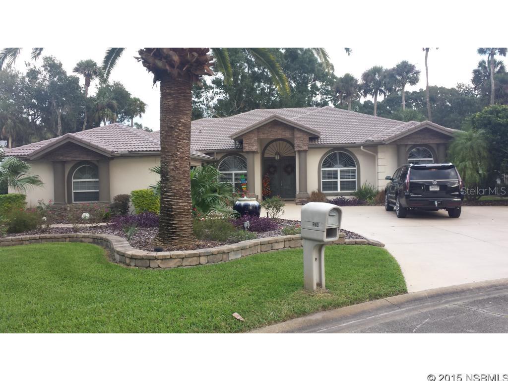 BEAUTIFUL CONTEMPORARY HOME IN SUGAR MILL COUNTRY CLUB. CONCRETE BLOCK AND STUCCO CONSTRUCTION. TILE ROOF. TRAY CEILINGS. DESIGNER KITCHEN. 2 BEDROOM SUITES. HEATED POOL AND SPA OVERLOOKING FAIRWAY ON BLUE COURSE.