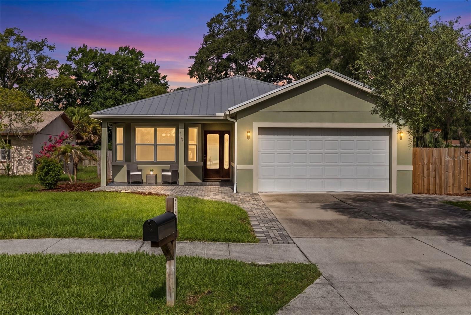 4 BEDROOM | 2 BATH | 1,863 SQ FT + TINY HOUSE GUEST SUITE | CUSTOM BUILD | NO HOA | WINTER PARK | 
Located just minutes from the charm and energy of Downtown Winter Park, this exceptional custom-built residence offers a rare opportunity to enjoy thoughtfully crafted living in one of Central Florida's most convenient and desirable corridors. Built in 2011 in a quiet community with no HOA restrictions, the home combines quality construction, modern aesthetics, and an outstanding lifestyle location that is difficult to replicate at this price point.
From its welcoming front porch to its expansive backyard retreat, the property is designed for both comfortable everyday living and effortless entertaining. Situated on a generous 70-foot wide lot, the double-wide driveway, attached garage, and extra-wide side yard with a double-wide 11'6" gate provide exceptional utility for those with a boat, RV, or trailer — a rare and coveted feature with no association limitations.
Throughout the interior, custom solid wood built-ins and cabinetry lend a warmth and permanence seldom found in production construction. The kitchen serves as the true centerpiece of the home, featuring custom solid wood cabinetry with pull-out pantry shelves, an extra-large entertaining island with abundant storage, solid stone countertops, and a striking tray ceiling with LED lighting that creates an elevated, modern ambiance. The open layout connects seamlessly to the living spaces and flows naturally toward the screened rear porch and the large, private backyard beyond.
The private primary suite offers a genuine retreat experience, complete with a tray ceiling, generous walk-in closet, and a beautifully appointed en-suite bath featuring both a separate shower and soaking tub. Custom built-ins throughout the additional bedrooms add function and character at every turn.
At 1,863 square feet, the main residence is complemented by a fully finished 156-square-foot backyard suite constructed in 2022, complete with a kitchenette and full bathroom — bringing the total living footprint to just over 2,000 square feet. Whether utilized for guests, extended family, a home office, or income-generating potential, this additional structure adds a remarkable dimension of flexibility and value rarely found in this market.
The durable metal roof and quality of construction throughout speak to a home built with longevity in mind. Freshly painted and brand new, high-end Waterproof Laminate flooring throughout. Energy efficiency is woven into the fabric of the home as well, with open-cell spray foam insulation in the attic and a smart water heater working together to meaningfully reduce utility costs — a genuine and ongoing financial benefit that discerning buyers will appreciate. All of this, positioned less than ten minutes from Publix, Starbucks, and Costco, and within fifteen minutes of the boutique dining, shopping, and cultural offerings of Downtown Winter Park.