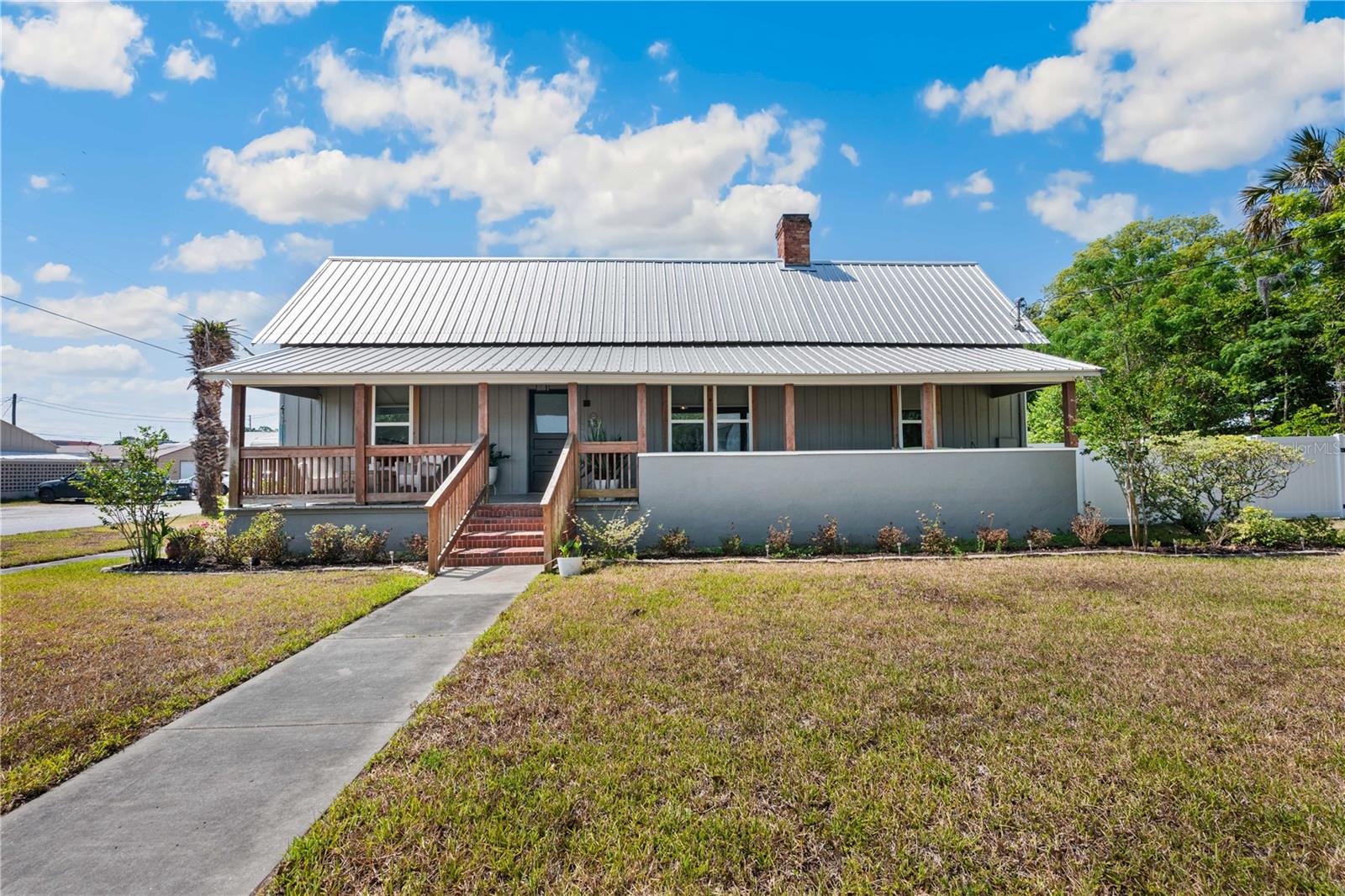 What's the deal with this house? Well it is completely remodeled and up to date with the finest, quality detail. This cozy space measures in at 1824 total sq ft and 1464 heated/cooled sq ft. The space begins on a vast open front porch. Street parking is available on both sides of home. From the front porch enter into the open space with a real wood burning fireplace. If we carry through there is more open space. Flanking the open space of what was a living room and dining room we have a full bathroom with dual sinks. There are two rooms that have separate entrances and share a door if need be. Opposite those two rooms with have a full room with bathroom and views of the street. A full kitchen awaits at the backdoor. There is also an entry space at the backdoor. Also, this space features a full laundry room with extra storage space for files and what nots. In place is a Lindo security camera for remote viewing. High speed lighting fast internet through Spectrum. Also, gas lines run for optional hookup. City water and sewer services already in place
This place is in the perfect location with the perfect price and perfectly remodeled. Perfectly perfect in every way.