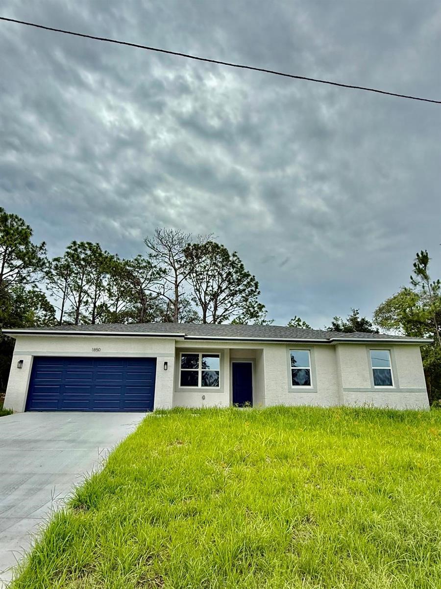 Beautiful new construction home located in the growing community of Citrus Springs! This 4-bedroom, 2-bathroom home offers a modern open-concept layout with spacious living areas, luxury vinyl flooring throughout the main living spaces, and porcelain tile in the bathrooms. The kitchen features stylish cabinetry, quality countertops, and stainless-steel appliances. The split floor plan provides privacy for the primary suite, which includes a walk-in closet and private bath. Enjoy a covered lanai and a spacious backyard with plenty of room for outdoor living. Don't miss this opportunity to own a brand-new home in one of Florida's fastest-growing areas!