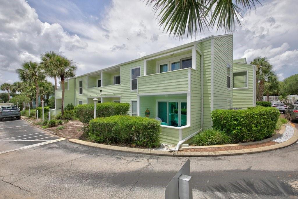 Welcome to your own slice of Old Florida paradise in the highly sought-after Quail Hollow community. This beautifully maintained 2-bedroom, 2-bath condominium offers the perfect blend of coastal charm, comfort, and investment potential. Ideally situated on the desirable south end of the complex, this residence captures refreshing ocean breezes year-round and provides a peaceful retreat just steps from the beach. Enjoy morning coffee or evening cocktails from either of the two private balconies while soaking in the relaxed island atmosphere. Inside, vaulted ceilings create a bright and spacious feel throughout the living areas. Recent upgrades include a new HVAC system as well as a new washer and dryer, offering peace of mind and convenience for years to come. The property is currently operating as a successful vacation rental, making it an excellent opportunity for investors, second-home buyers, or those seeking a full-time coastal residence. Just a short walk up the dune leads you directly to the beach, while the community pool is conveniently nearby. Quail Hollow is known for its charming coastal color palette, lush tropical landscaping, and timeless Old Florida character. Vibrant hibiscus blooms, swaying palm trees, and beautifully maintained grounds create a setting that feels worlds away from the everyday. Whether you're searching for an income-producing property, a beach getaway, or a place to call home, this charming condominium captures the essence of island living. With its relaxed atmosphere, tropical beauty, and unbeatable location, you'll never want to leave.