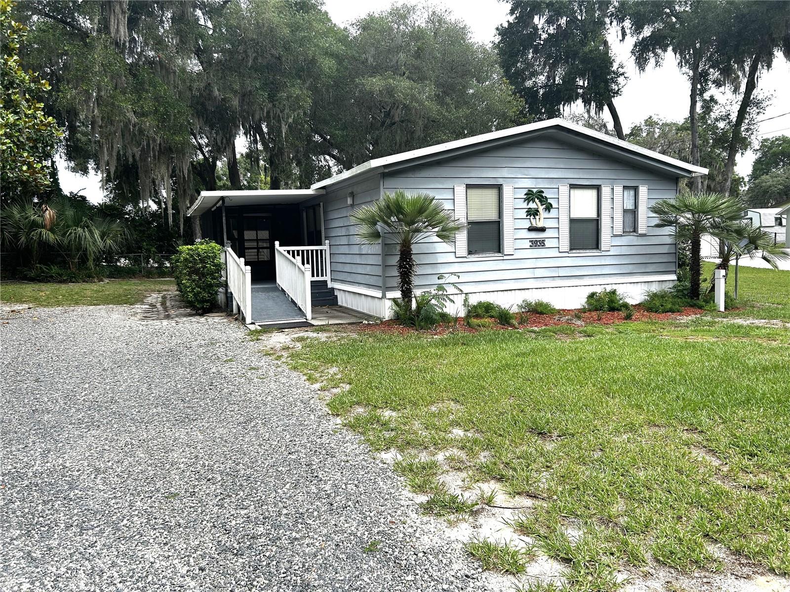 Opportunity awaits with this spacious 2-bedroom, 2-bath double-wide mobile home with a view of the lake! Featuring a functional floor plan with generously sized bedrooms, a large living area, and plenty of potential, this home is ready for your personal touch. While it needs some repairs and updating, it offers a great chance for investors, handymen, or buyers looking to build equity. Enjoy the extra space, ample storage, and the possibility to customize the home to fit your style. Conveniently located and priced to reflect its condition, this property is being sold as-is and has tremendous potential for the right buyer.