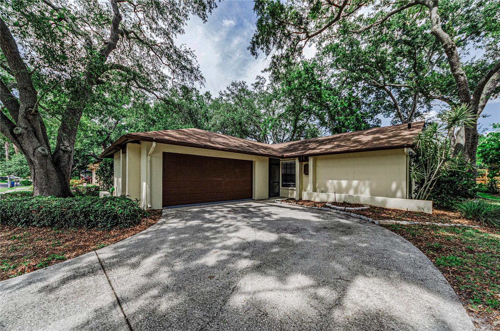This move-in-ready 3-bedroom, 2-bathroom home with a 2-car garage lives far larger than expected, beginning with an approximately 273-square-foot enclosed Florida room with central heat and air, expanding the home to approximately 1,381 square feet of usable space. Filled with natural light and overlooking the backyard, it is ideal as a spacious family room, home office, or creative retreat. A separate covered and screened porch opens the home to the backyard, making outdoor living comfortable in every season.

Inside, the kitchen and both bathrooms were remodeled in 2022 with granite countertops and updated fixtures. The kitchen also features stainless steel appliances. Crown molding and interior and exterior paint were completed in 2022. The split bedroom floor plan offers added privacy, and the washer and dryer are included. The expensive projects are already taken care of, with a NEW AC SYSTEM installed in July 2026, a WATER HEATER approximately one year old, and a NEW ROOF to be installed prior to closing.

Located in the heart of desirable 34683, the home is zoned for Ozona Elementary, Palm Harbor Middle, and Palm Harbor University High School, with the middle school a couple of blocks away. The large backyard offers plenty of room for entertaining, gardening and enjoying the outdoors. Close to downtown Palm Harbor, quaint Dunedin, the Pinellas Trail, parks, shopping, dining, and the beaches of Honeymoon and Caladesi Islands. No flood insurance required. Move in, spread out, and enjoy everything this home and location have to offer.
