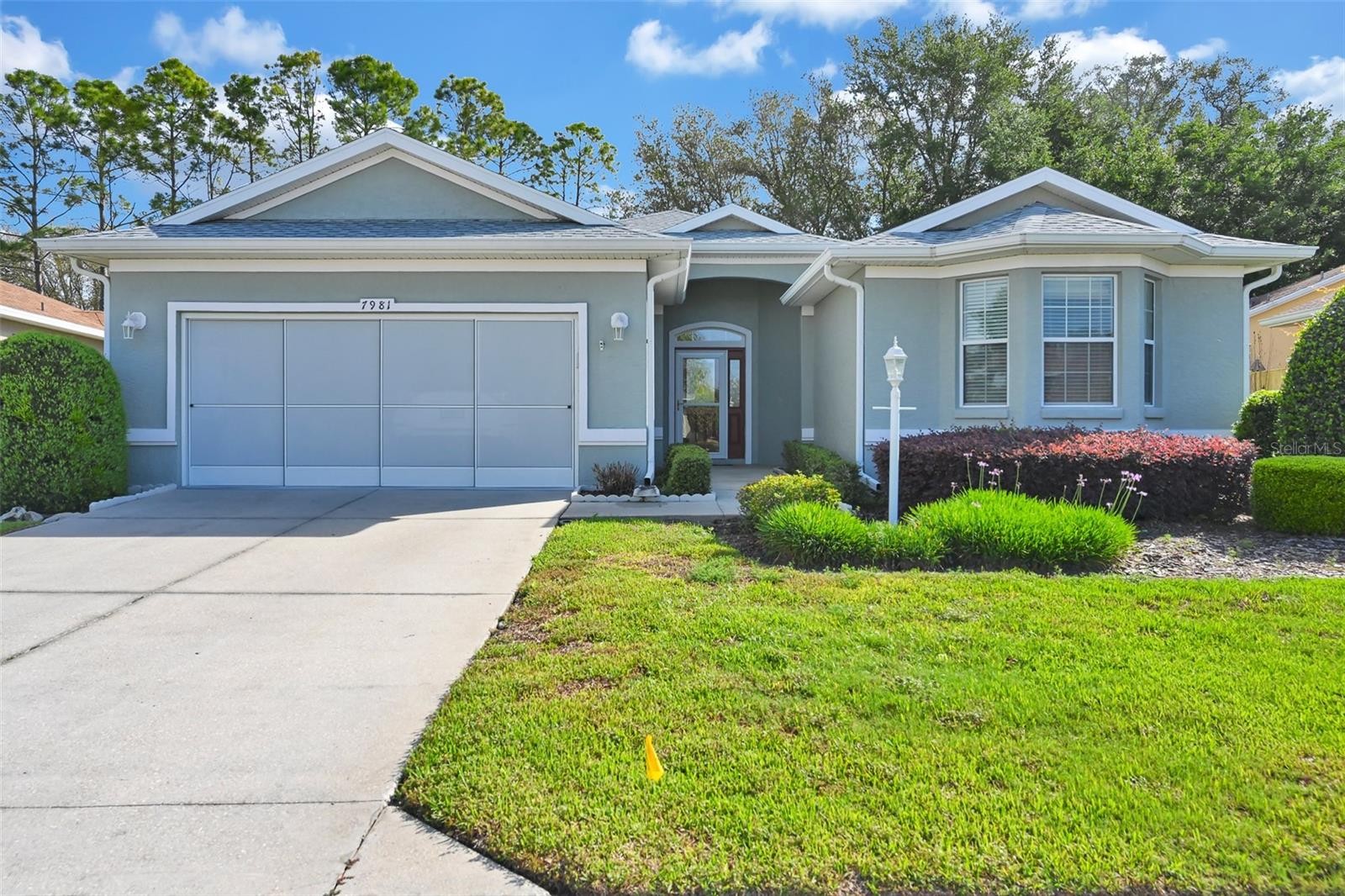 This beautifully maintained 3-bedroom, 2-bath home sits on a premiem lot and offers the perfect blend of comfort, functionality, and style. The spacious island kitchen opens seamlessly to the family room and features abundant cabinet space, a pantry, and elegant under-cabinet lighting. A charming bay window fills the space with natural light, while the formal dining room provides an ideal setting for entertaining guests. The primary suite is a true retreat, boasting two walk-in closets with built-in shelving and a luxurious en-suite bathroom complete with dual sinks, a relaxing garden tub, and a separate shower. Additional highlights include an indoor laundry room with built-in storage and the convenience of an included washer and dryer. The garage has been upgraded with durable epoxy flooring and includes a dedicated workshop area. Step outside to enjoy the Lanai and screened-in birdcage patio and a fully fenced backyard with a beautiful park setting and no rear neighbors, offering exceptional privacy. Major updates add peace of mind, exterior painted in 2020, air conditioning system installed in 2020, along with a roof installed in 2024. Location is great, near Equestrian Center, Medical offices and restaurants. Furniture is optional