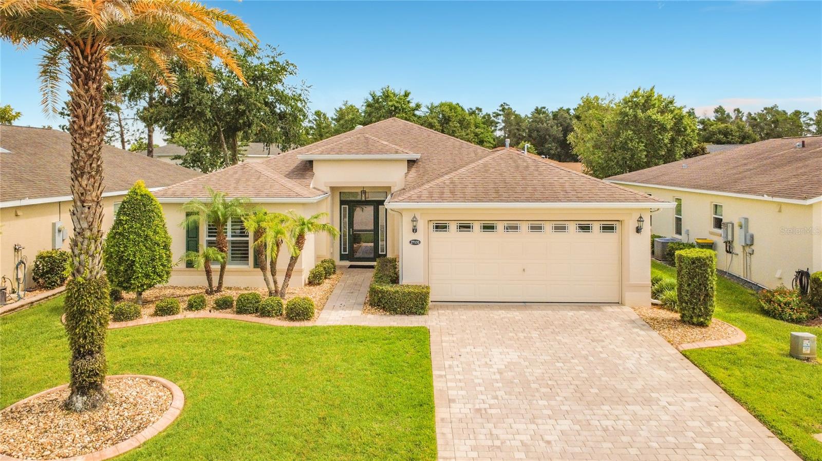 Welcome to resort-style living in Arlington Ridge, one of Leesburg's premier 55+ guard-gated golf communities. This beautifully maintained 3-bedroom, 2-bath home is one of the few properties in the neighborhood offering its own private pool, providing a rare opportunity to enjoy true Florida outdoor living without leaving home. Inside, you'll find an open-concept floorplan designed for both everyday comfort and entertaining, complete with a built-in surround sound system, screened rear patio, garage screen, and an extended-depth garage offering additional storage and workspace. Recent upgrades include a tankless water heater (2025), water softener system (2025), and a freshly painted pool deck. Arlington Ridge residents enjoy an exceptional amenity package including an 18-hole championship golf course, on-site restaurant and tavern, community pools, tennis and pickleball courts, fitness center, and golf-cart-friendly streets throughout the community. HOA dues include lawn maintenance, cable television, and high-speed internet, allowing for truly low-maintenance living. Conveniently located near Florida's Turnpike, US-27, shopping, dining, entertainment, and major medical facilities, this home offers the perfect combination of privacy, convenience, and active-adult lifestyle living in one of Lake County's most sought-after communities.