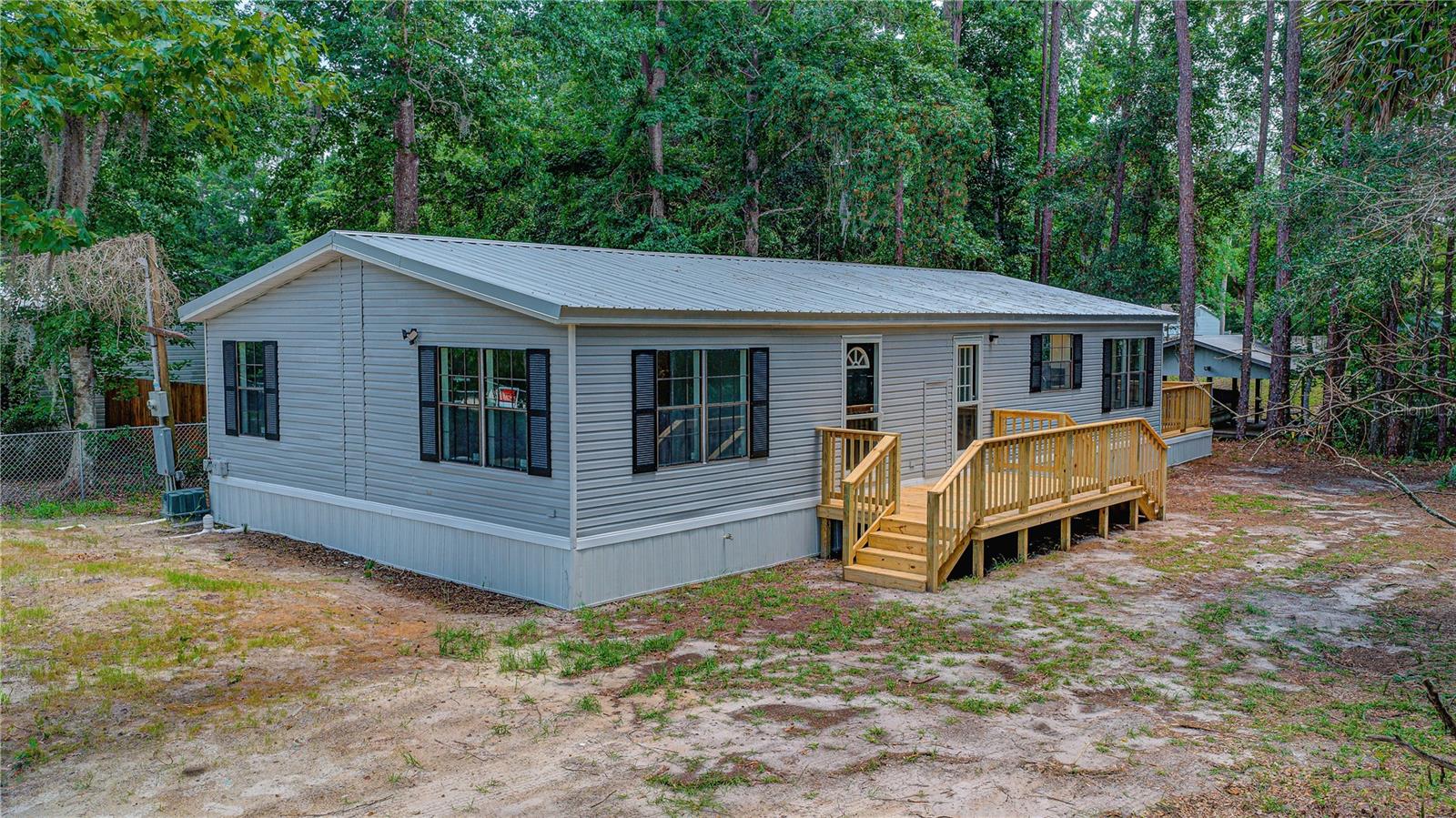 Welcome to waterfront living at its finest in beautiful Satsuma, Florida! This home is fully renovated.  118 Waterway Drive offers direct canal access to Dunns Creek which offers easy access to the scenic St. Johns River—perfect for boating, fishing, and enjoying the Florida lifestyle right from your backyard.

No detail has been overlooked in this top-to-bottom renovation. The home features a brand-new roof, a new HVAC system, new hot water heater, and a completely new septic system including drain field—giving you peace of mind for years to come. Inside, you’ll find stylish new LVP flooring throughout, a beautifully updated kitchen with upgraded appliances, modern cabinetry, and sleek countertops, as well as fully remodeled bathrooms with new fixtures and vanities.

Whether you're looking for a full-time residence, a weekend retreat, or an investment opportunity, this move-in-ready waterfront property delivers comfort, quality, and access to one of Florida’s most iconic rivers.

Don’t miss your chance to own a slice of paradise—schedule your private showing today!