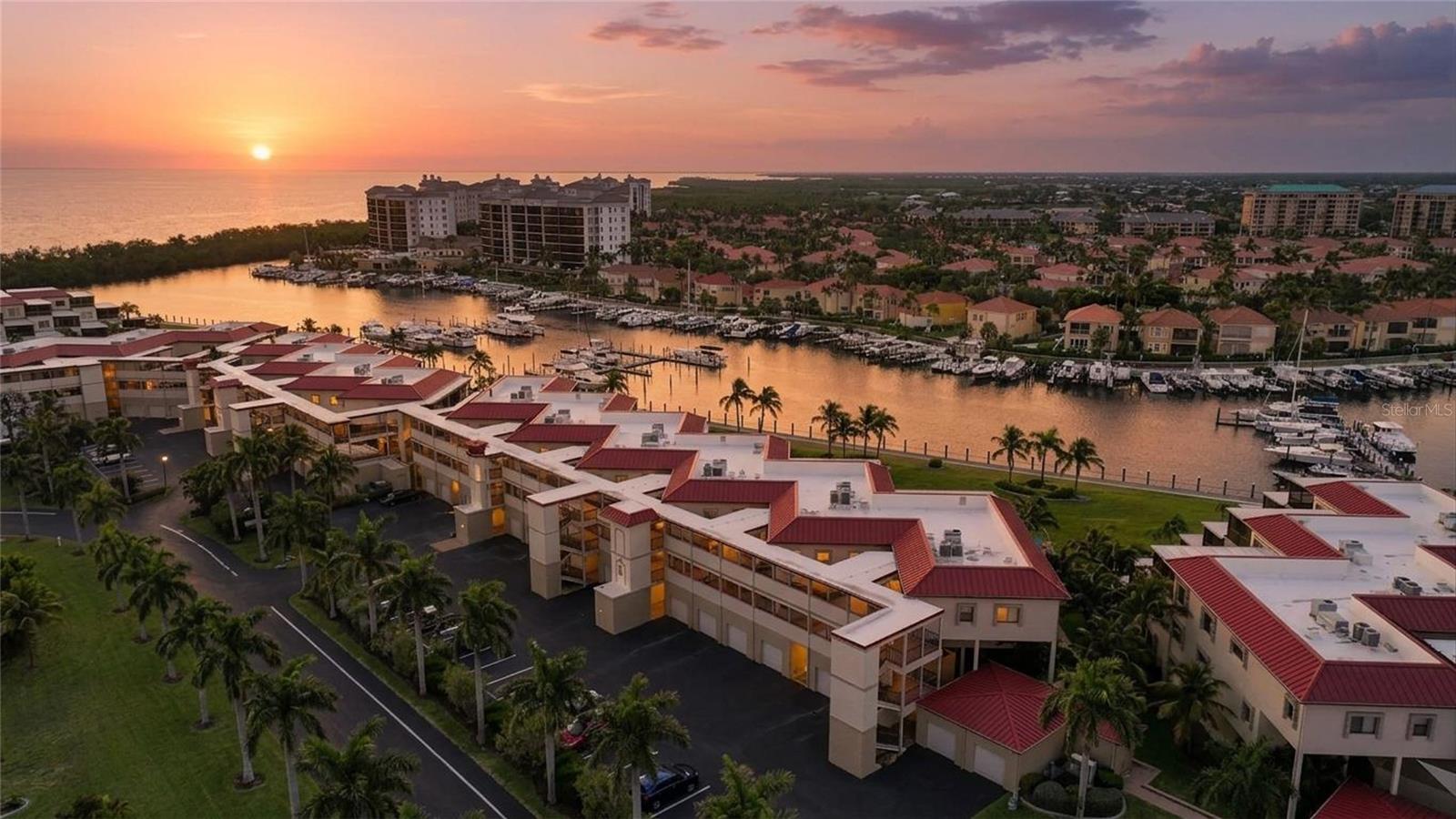TALK ABOUT A BEAUTIFUL 3 BEDROOM 2 BATH CONDO IN SOUTHSHORE, LOCATED IN BURNT STORE MARINA. LAVISH CUSTOM DESIGNED CHEFS KITCHEN. BEAUTIFUL STAINLESS STEEL APPLIANCES, QUARTZ COUNTERS LAID OUT FOR THE CHEF IN THE FAMILY. When you enter you will notice the very large open floor plan that includes the kitchen, dining and huge living room. Looking out of the living room there is a very large screened in Lanai, with a bar and lots of area for entertaining. ALL WITH AN AWESOME WIDE VIEW OF OF THE CANAL THAT LEADS INTO THE MARINA.