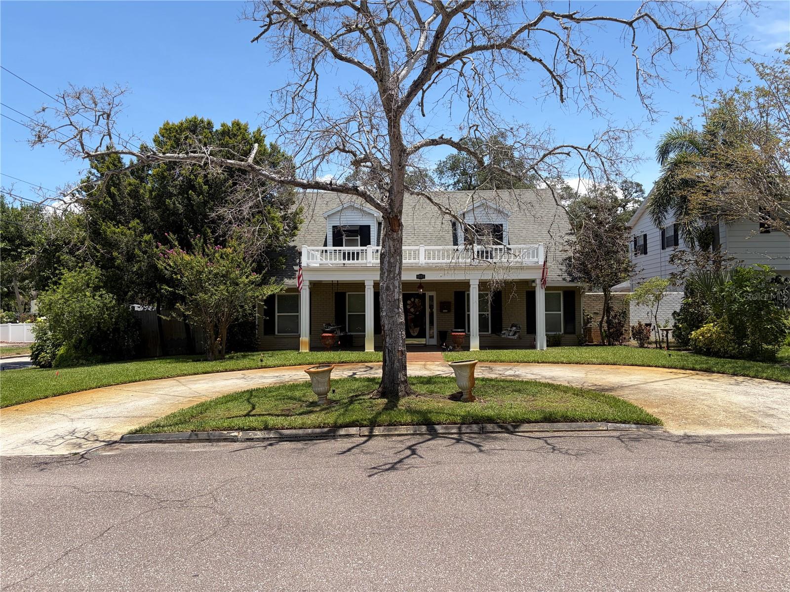 Exceptional South Tampa Living with Unmatched Versatility and Quality Upgrades
Perfectly situated in one of South Tampa's most desirable neighborhoods, this spacious and versatile 3-bedroom, 3-bath residence offers the ideal blend of comfort, functionality, and thoughtful craftsmanship. With multiple living spaces, extensive upgrades, and a location that is second to none, this home is truly one of a kind.

Designed for today's lifestyle, the home features two dedicated office spaces, including one with a private exterior entrance—ideal for remote work, a home business, client meetings, or a creative studio. Multiple gathering areas include a formal living room, a separate sitting room, an upstairs retreat, and a spacious game/family/bar room perfect for entertaining.

The custom-designed kitchen is both beautiful and functional, showcasing handcrafted cabinetry, generous workspace, a charming garden window for fresh herbs, and a seamless connection to the formal dining room. The home also includes a spacious laundry room, while every bedroom features a generous walk-in closet for exceptional storage.

The primary suite offers a spa-inspired bathroom with dual shower heads, a poured concrete shower pan engineered for superior drainage and leak prevention, a heat lamp, and plumbing already in place for a convenient dog wash station. The guest bath also features a walk-in shower with the same quality poured concrete construction. A half bath is located downstairs.  Two secure safe rooms provide added peace of mind.

Quality craftsmanship and recent improvements are evident throughout, including beautiful new Lauzon flooring, fresh interior paint, custom stair treads, risers, and steps, new A/C ductwork, and a new high-volume gas tankless water heater. Energy-efficient double-pane pop-out windows enhance comfort while helping keep utility costs low.

Additional highlights include a dedicated craft room with its own A/C unit, a cozy working fireplace, a new well pump, new pavers, a secured outdoor entertaining area, a circular driveway, and a two-car garage built on a reinforced poured concrete foundation designed to support the future addition of a second-story apartment or living space.

Efficiency and value continue with natural gas service to the stove, dryer, and tankless water heater, while the irrigation system operates on private well water—significantly reducing water costs. The home's thoughtful design and efficient systems contribute to impressively low utility bills. Pest control has been consistently maintained by the current owners throughout their ownership, providing additional confidence in the home's care and maintenance.

All appliances convey, making this home truly move-in ready.

Located just minutes from shopping, downtown Tampa, major bridges, Tampa International Airport, and zoned for highly sought-after Grady Elementary, Coleman Middle School, and Plant High School, this exceptional property offers the perfect combination of location, flexibility, quality, and long-term value.

This is a rare opportunity to own a meticulously maintained South Tampa home, on a corner lot, where craftsmanship, efficiency, and lifestyle come together beautifully.