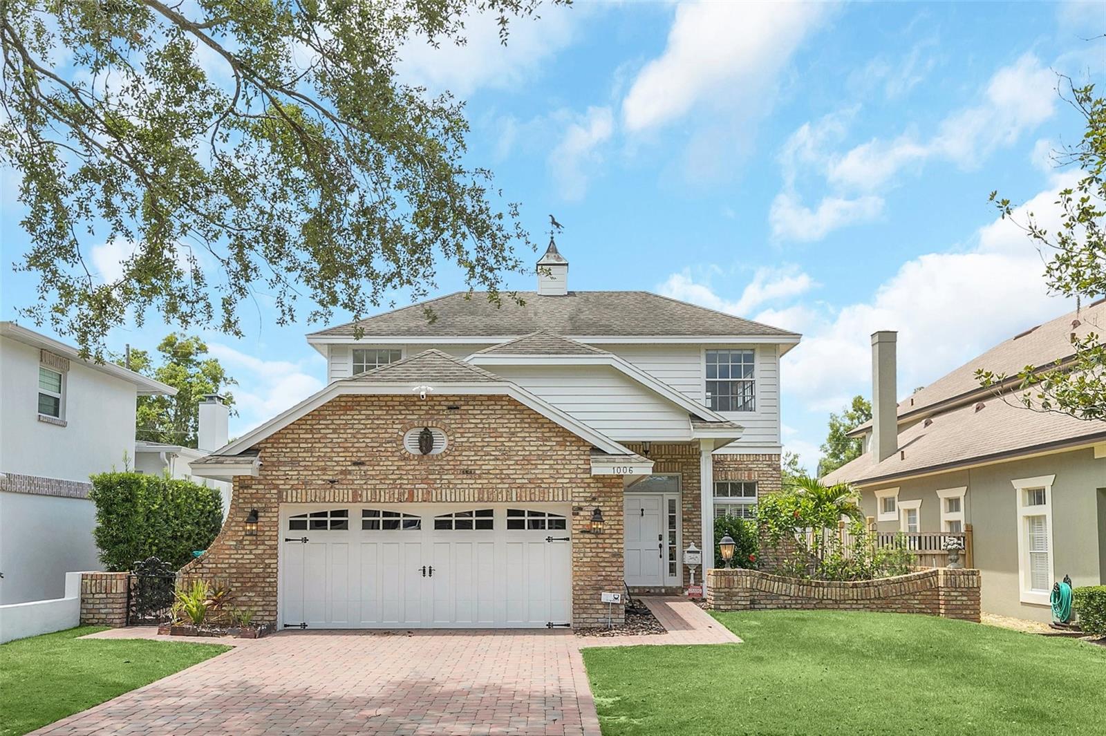This highly desirable Orwin Manor home is coming available for lease or lease to own! Centrally located to all restaurants and cultural activities in Winter Park, College Park, Downtown Orlando and more!  Paver driveway, side and back patio, and apron to the street as well as a sidewalk to the home.  Additionally, the electric fireplace was retiled with a beautiful soft and popular high-quality tile.  Two car garage with epoxy coated floor and Tesla Charger. This home was built by one of Winter Park's most sought-after builders.  Three bedrooms are on the main floor as well as the spacious living areas.  An integrated living room/dining room features the newly renovated hardwood cabinetry and dry bar. A large flex space or 4th bedroom on the second floor has a full bath and closet.  Additional rear flex space can serve as home office or home gym.