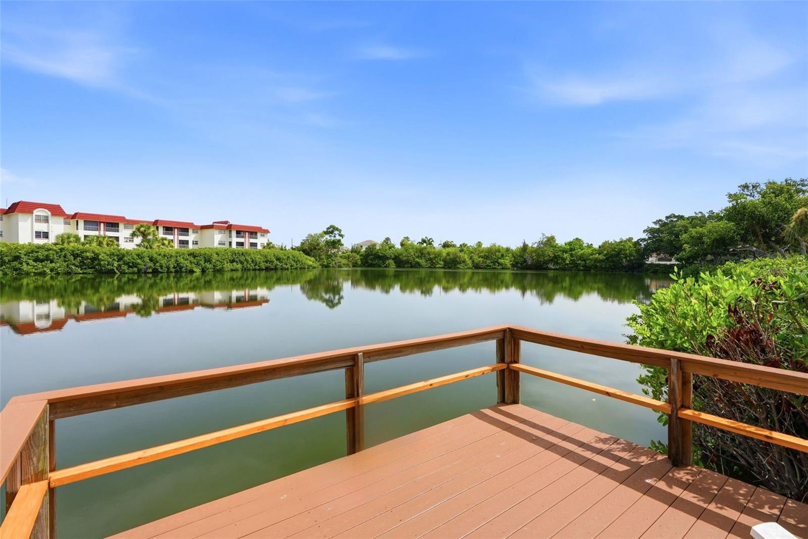Virtually Staged. END UNIT. BEAUTIFULLY UPDATED. MOVE-IN READY.

Enjoy easy Florida living in this beautifully renovated 2-bedroom, 1-bath END UNIT condo in the desirable Lake Overlook community of Shore Acres. With extra windows, added privacy, and plenty of natural light, this home offers a bright, open feel from the moment you walk in.

Following the 2024 hurricanes, this home experienced flooding and has since been PROFESSIONALLY REMEDIATED and COMPLETELY RENOVATED, giving the next owner the opportunity to enjoy a completely updated interior without the cost or hassle of the work. Updates include BRAND-NEW stainless steel appliances, including a slide-in range, white shaker cabinetry, quartz countertops, luxury vinyl plank flooring, fresh paint, plantation shutters, updated lighting, and a beautifully remodeled bathroom.

Additional improvements include a NEW HVAC (2025) and NEW Water Heater (2025), providing added peace of mind.

The spacious living and dining areas flow seamlessly to your PRIVATE PATIO, creating the perfect space to enjoy your morning coffee or unwind at the end of the day.

Lake Overlook offers fantastic amenities including a community pool, clubhouse, fitness center, fishing dock, community laundry, and assigned parking. The HOA fee includes cable TV, internet, water, sewer, trash, exterior maintenance, roof, and grounds maintenance—making everyday living simple and convenient.

Located just minutes from Downtown St. Petersburg, waterfront parks, Weedon Island Preserve, shopping, dining, and I-275, this home offers the perfect balance of peaceful living and city convenience. Whether you're searching for your primary residence, seasonal retreat, or your next investment, this move-in ready condo is one you won't want to miss.