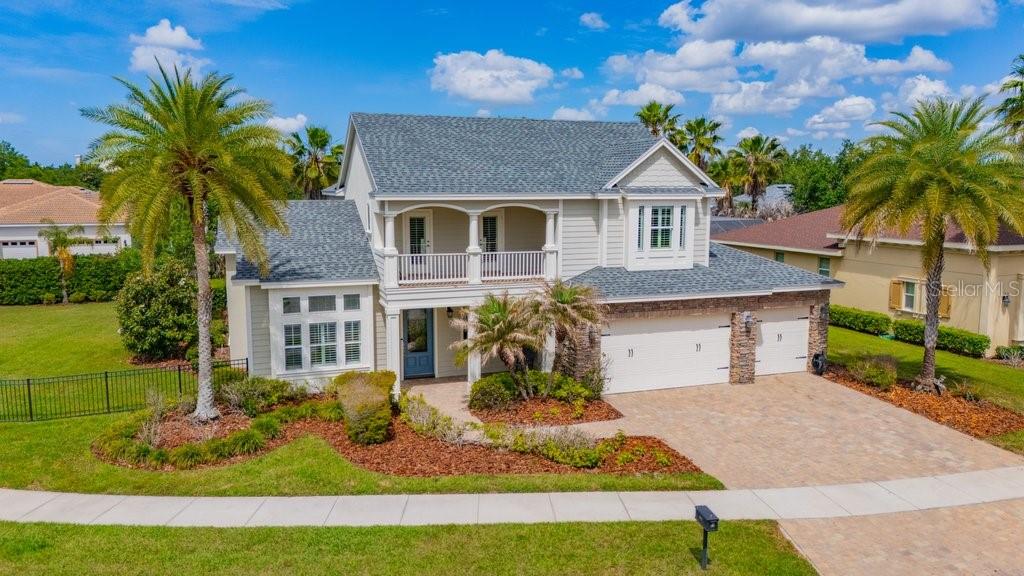Stunning Award-Winning Estate Home on The BEST Lot in Gated FishHawk Ranch. Nestled on a quiet cul-de-sac in the exclusive gated community of Chapman Crossing, this exceptional Tampa Bay Builder Association Parade of Homes award-winning design offers the perfect blend of luxury, privacy, and location. Situated on a fully fenced, nearly half-acre homesite with no side neighbor, the property enjoys a truly park-like setting rarely found in FishHawk Ranch. Boasting more than 4,000 square feet of thoughtfully designed living space, this impressive home features 5 bedrooms, 3.5 bathrooms, a private office, spacious bonus room, and a 3-car garage. The first-floor primary suite serves as a private retreat, complete with dual walk-in closets and a spa-inspired bath featuring a garden tub, walk-in shower, and separate water closet. A dedicated office with custom trim work and striking glass wall accents provides an elegant work-from-home space. Also located on the first floor, Bedroom 2 showcases beautiful wood flooring and offers flexibility as a guest suite, in-law accommodation, or secondary office. The beautifully updated kitchen is designed for both everyday living and entertaining, featuring quartz countertops, 42-inch cabinetry, stainless steel double ovens, a gas cooktop, warming drawer, and an oversized center island. The kitchen flows seamlessly into the breakfast nook and expansive family room, all overlooking the sparkling pool, spa, and expansive backyard oasis. Upstairs, you'll find a large bonus room and three generously sized bedrooms. One bedroom offers a private balcony, while another includes an ensuite bath and oversized closet, making it ideal for guests or growing teens. Additional upgrades include plantation shutters throughout, an EV charging station, and a brand-new roof installed in 2025. Outdoor living is equally impressive, with a fully equipped outdoor kitchen and built-in dining area designed for year-round enjoyment. Enjoy a walkable lifestyle with convenient access to Park Square, the Aquatic Center, top-rated schools, shopping, and dining. Residents of FishHawk Ranch also enjoy world-class amenities, including resort-style pools, miles of nature trails, sports courts, playgrounds, and more. A rare opportunity to own one of FishHawk Ranch's most desirable homes. Schedule your private showing today.