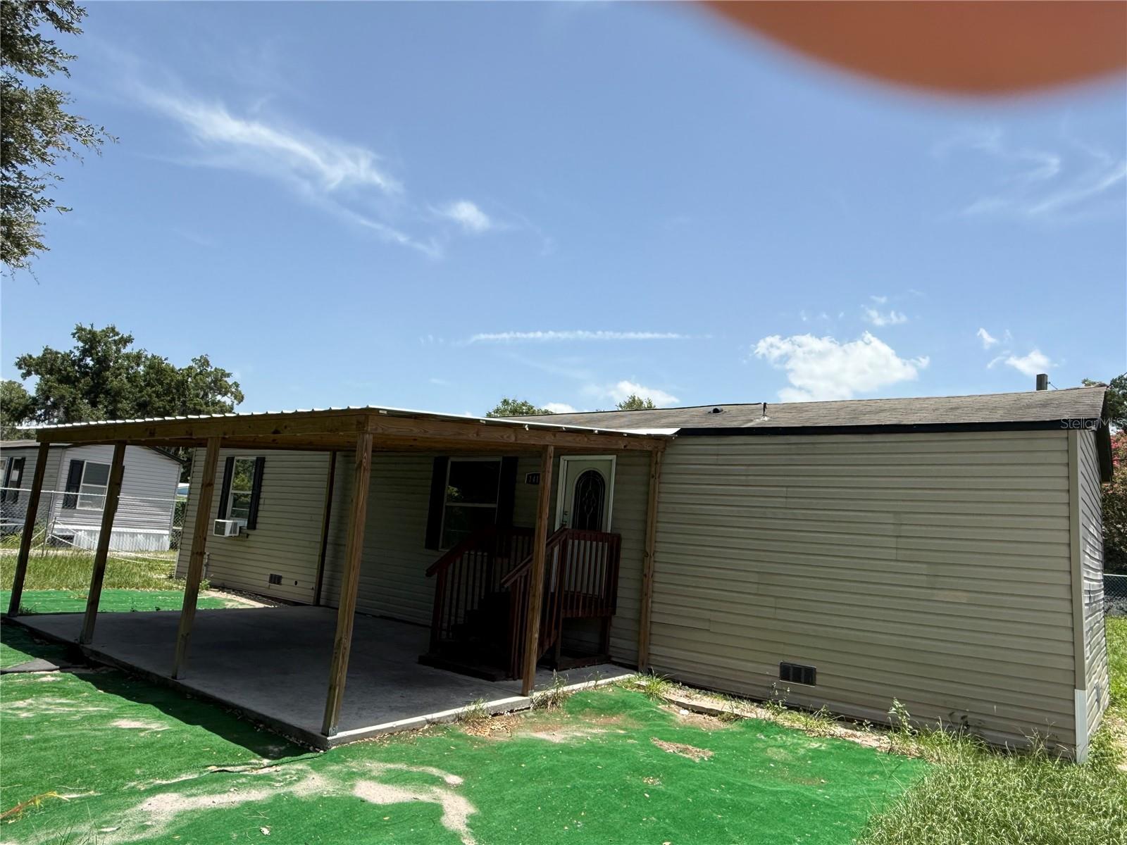 Welcome to this beautifully maintained 2020 manufactured home offering 2 bedrooms and 2 full bathrooms in a convenient Lakeland location.    This move in ready home features an open concept floor plan, luxury vinyl flooring, a bright living area, and functional kitchen equipped with a refrigerator, range, dishwasher and microwave.  The split-bedroom layout provides added privacy, with a spacious primary suite featuring its own private bath.   Enjoy indoor laundry hookups, a generous yard and the freedom of NO HOA.  Conveniently located just minutes from shopping, restaurants, medical facilities, the Polk Parkway, and I-4 making commuting easy.    Don't miss this opportunity, schedule your private showing today.