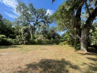 Beautiful vacant lot on a quaint, quiet road in the Hammock surrounded by beautiful large oak trees. Located off the Scenic A1A close to Bings Landing and the Intracoastal Waterway. This spacious 16,406 sf lot is ready for your dream home to be built. This lot is located close to premier golf courses, beautiful beaches and plenty of walking and bike trails. No HOA, plenty of space to park your boat or RV. Lot is cleared in the middle with large trees surrounding perimeter. City water is in. Don't miss your chance to own a piece of paradise in one of Palm Coast's prime location.
