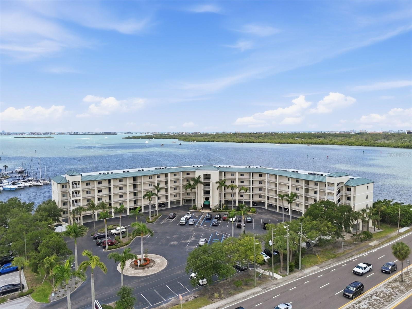 This unit is bringing in 35,000+/year!! It comes with future bookings and is already filled up through the second week of August!!
Escape to your own waterfront retreat and enjoy breathtaking views that instantly put the day's worries behind you. This studio condo is ideally located just minutes from shopping, dining, public boat ramps, marinas, and some of the area's best beaches.

The community offers an impressive lineup of amenities, including a heated and cooled pool, oversized spa, fishing pier, fitness room, and abundant parking for residents and guests. Major updates provide peace of mind, with a newer A/C system and roof installed in December 2023.

Inside, the flexible open-concept layout allows for a variety of furniture arrangements, making it easy to create a space that fits your lifestyle while maximizing the stunning views.

For investors, this property presents an excellent opportunity, with similar studio units in the community generating approximately $25,000 to $35,000+ in annual rental income.