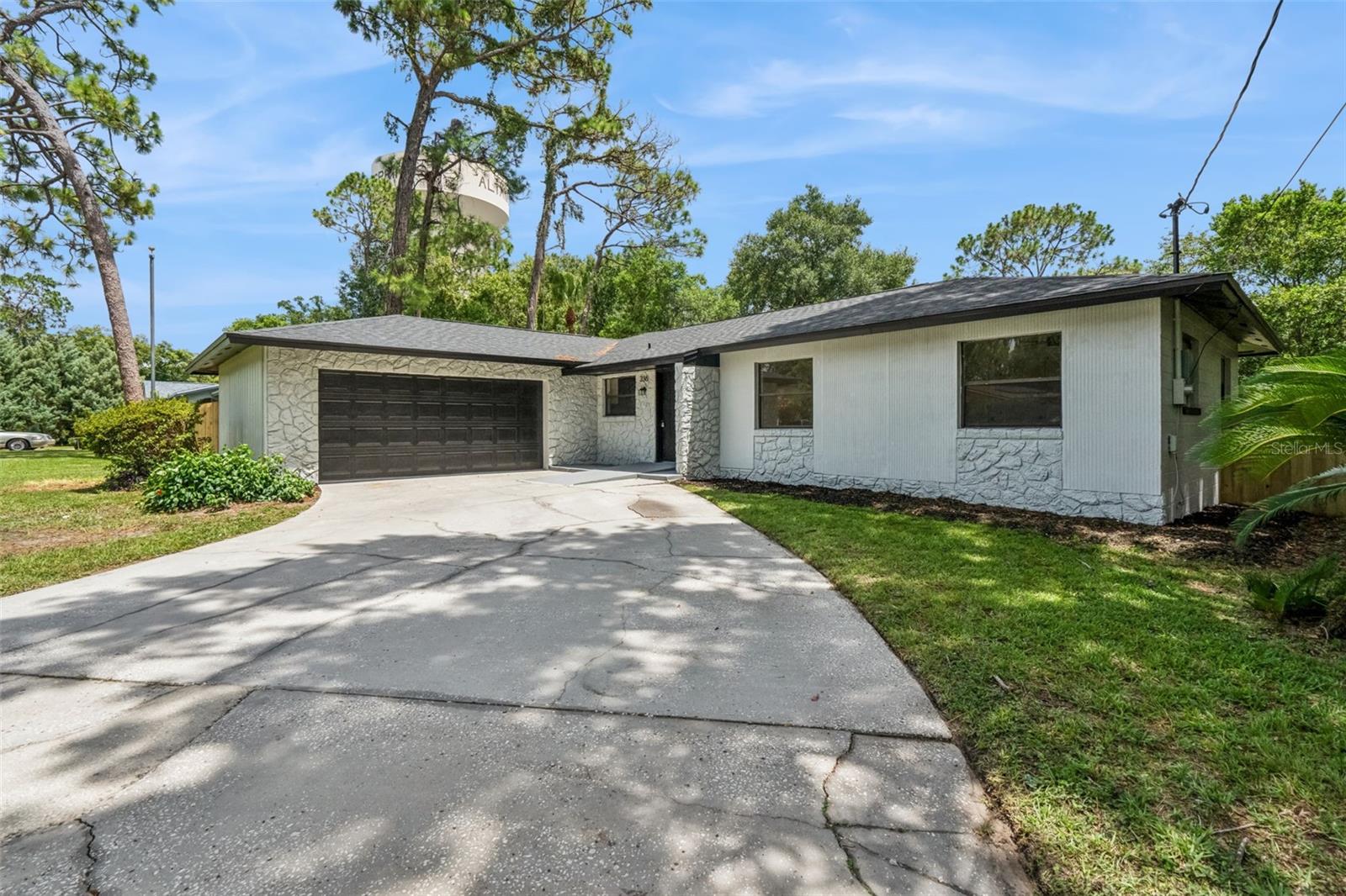 Welcome to 336 Tangerine Street - this is an ideal POOL home or rental property for those seeking an updated living space. This renovated home has 4 bedrooms with 2 bathrooms. The renovations include new kitchen cabinets, kitchen appliances and Quartz countertops, fully renovated luxurious bathrooms, new flooring, new lighting, new ceiling fans and more. NEW Roof in 2026, and Water Heater in 2025! This home also has a newly painted interior/exterior. Quiet Neighborhood, Close to all Major Highways, and Shopping Centers. Also an excellent rental investment opportunity.