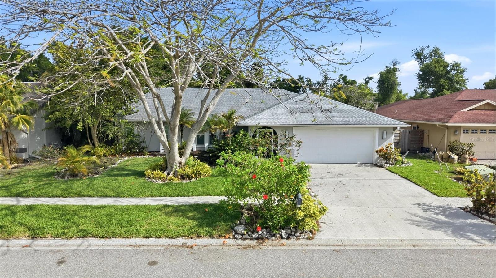 Nestled near the end of a Cul-de-Sac, with a Private Setting backing to a Nature Preserve, this Beautifully maintained 3-bedroom, 2-bathroom split-plan home offers 1,999 SF of living space with the perfect blend of comfort, updates, and location. Major improvements provide peace of mind, including a new roof and skylights (2018), impact windows (2019 & 2020), A/C system (2020), and hot water heater (2020).
Step inside to find an updated kitchen and bathrooms, complemented by wood laminate and tile flooring throughout. The living room and primary bedroom feature elegant plantation shutters, adding both style and functionality. An indoor laundry room with additional storage adds everyday convenience.
Enjoy flexible living with an expansive 390 SF Air Conditioned Florida Room overlooking the fenced backyard—ideal as a game room, playroom, fitness space, home office, or entertainment area. A screened entry porch enhances curb appeal and provides a welcoming outdoor space, while the oversized 2-car garage offers ample storage.
Ideally located near Colonial Oaks Park with access to a gymnasium, basketball courts, tennis, pickleball, playgrounds, and picnic areas. Just minutes from Doctors Hospital, shopping, dining, and I-75, this home delivers both tranquility and accessibility.
Don’t miss this move-in ready gem in a highly desirable location!